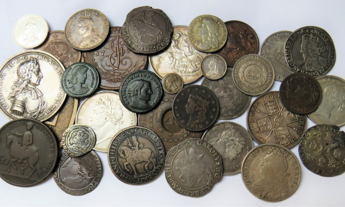 A collection of coins showing a range of different coins for a collector