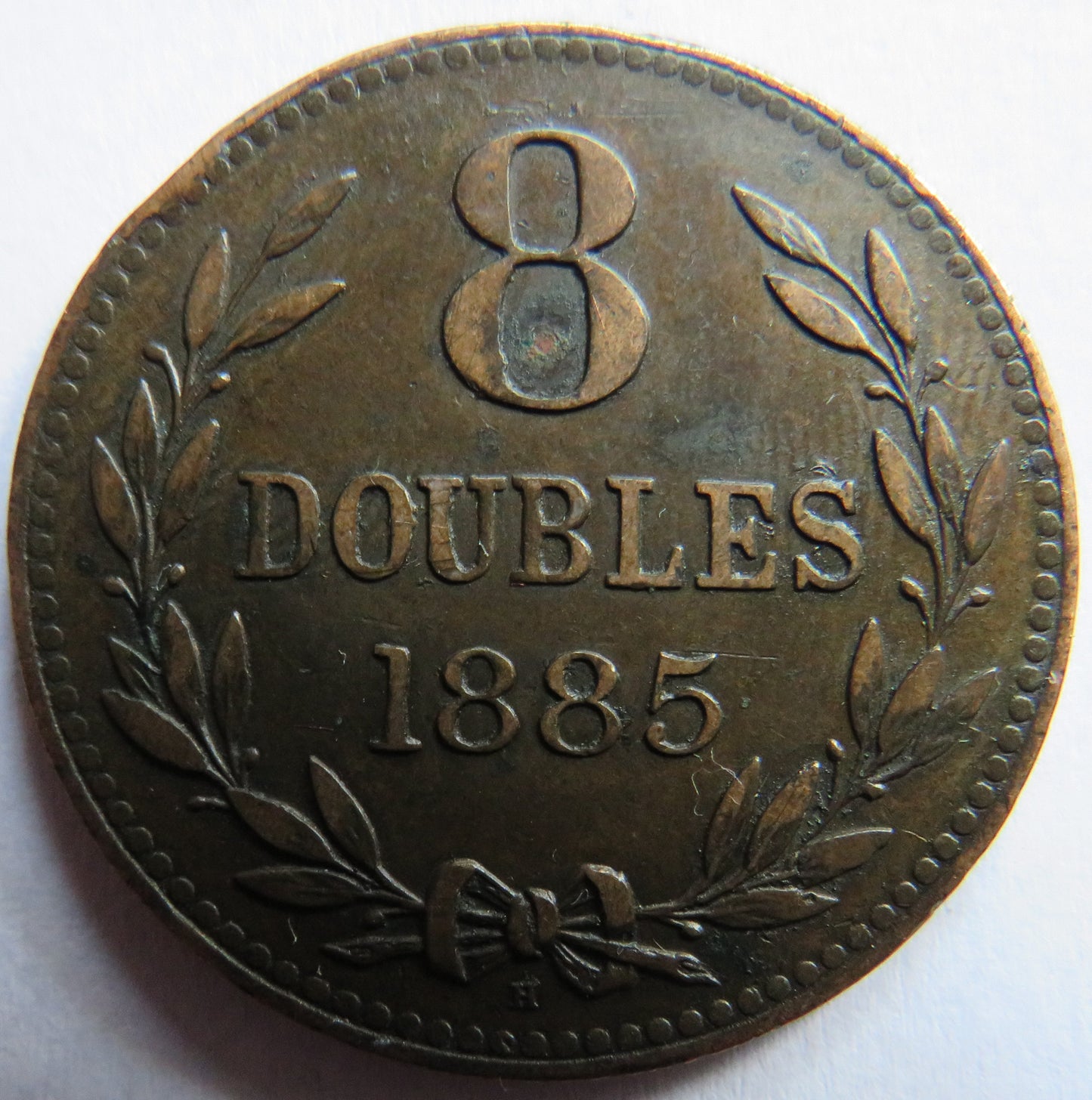 1885-H Guernsey 8 Doubles Coin