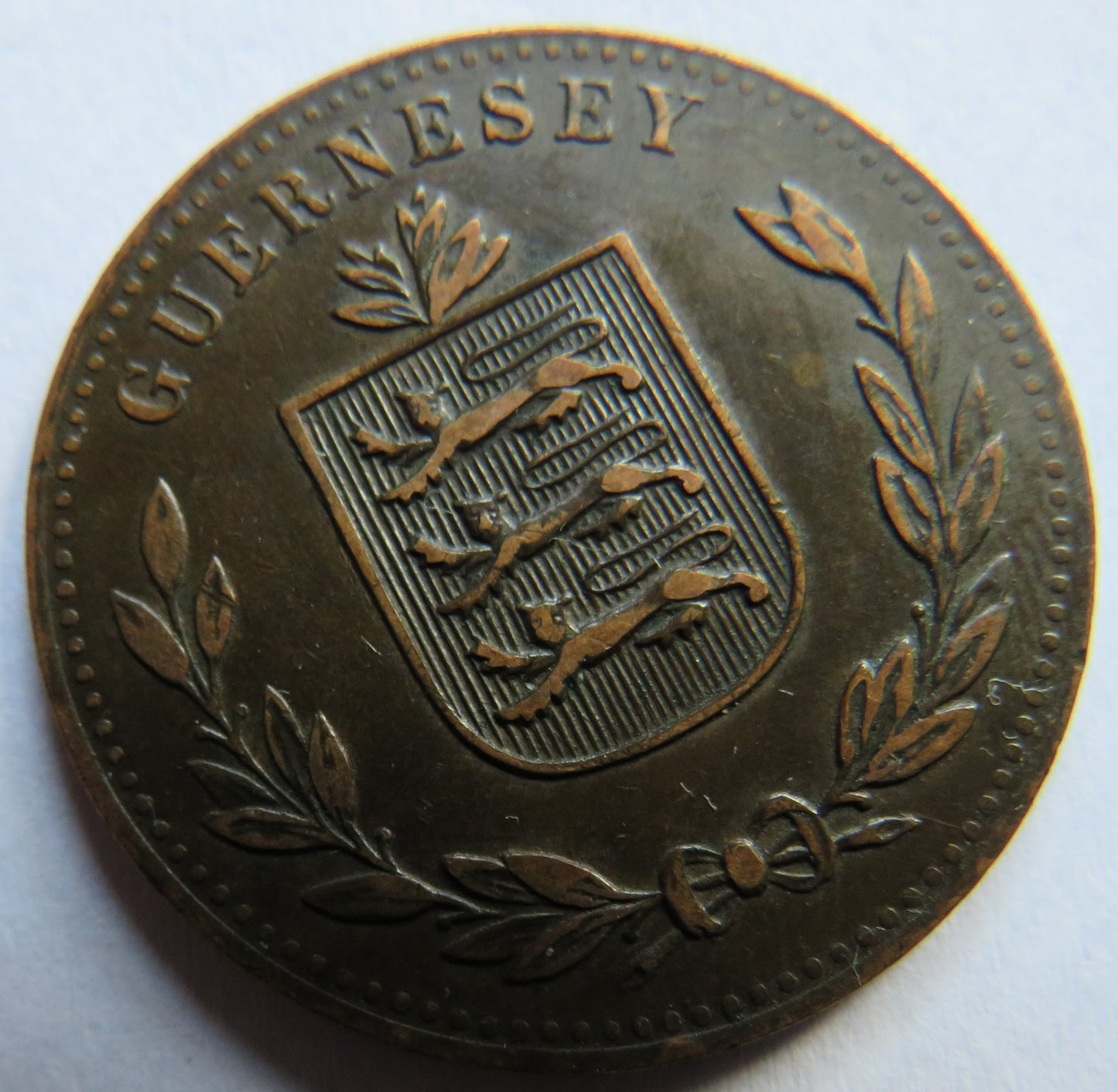 1918-H Guernsey 8 Doubles Coin