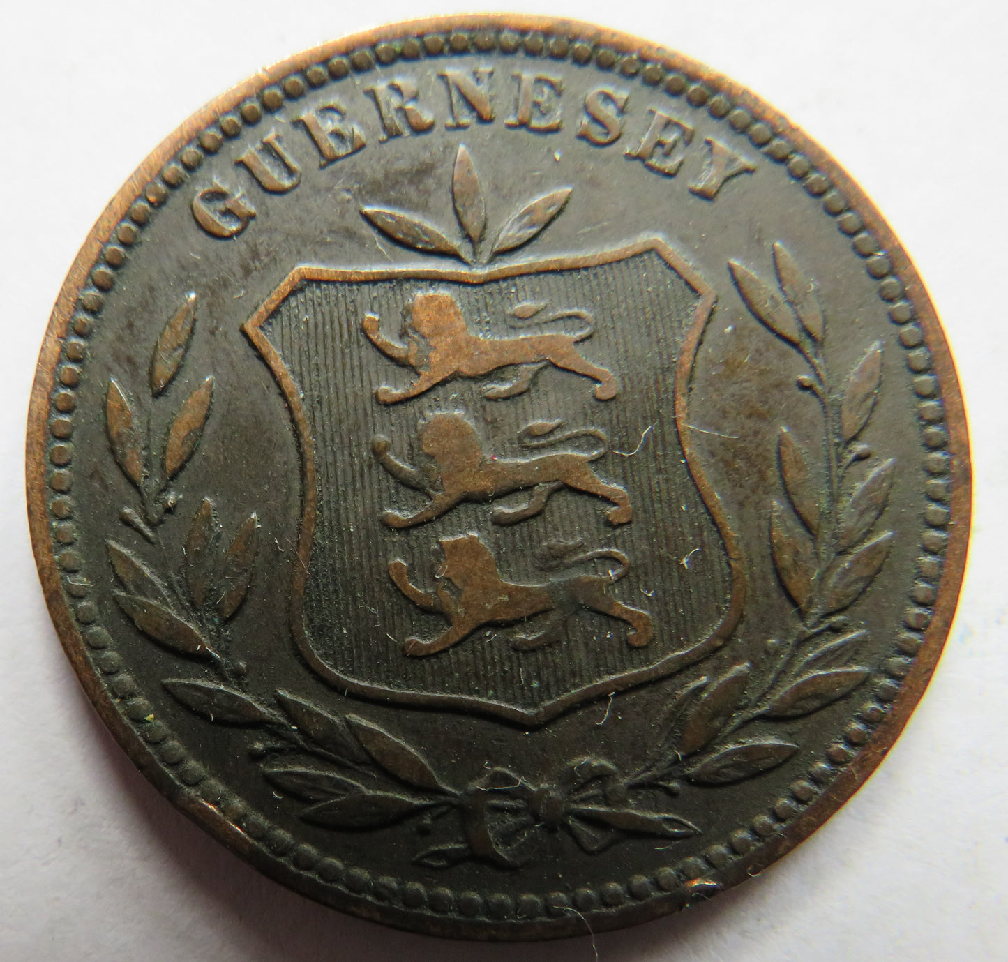 1902-H Guernsey 8 Doubles Coin