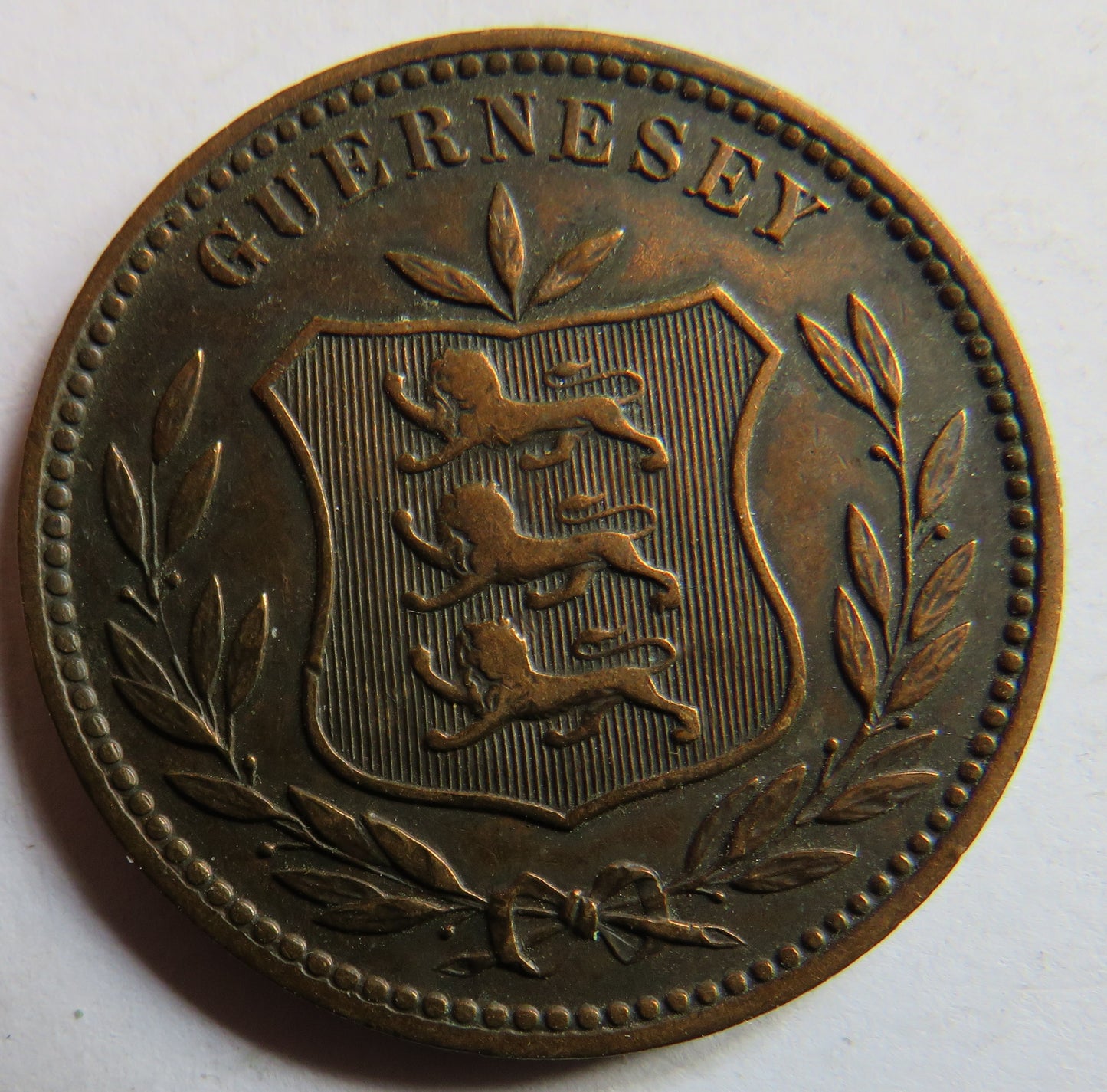 1902-H Guernsey 8 Doubles Coin