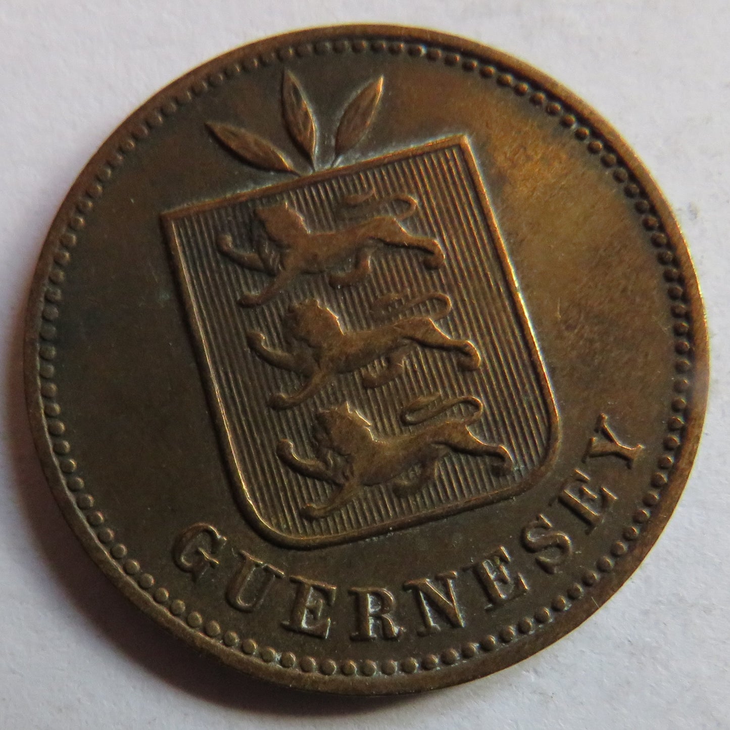 1906-H Guernsey 4 Doubles Coin