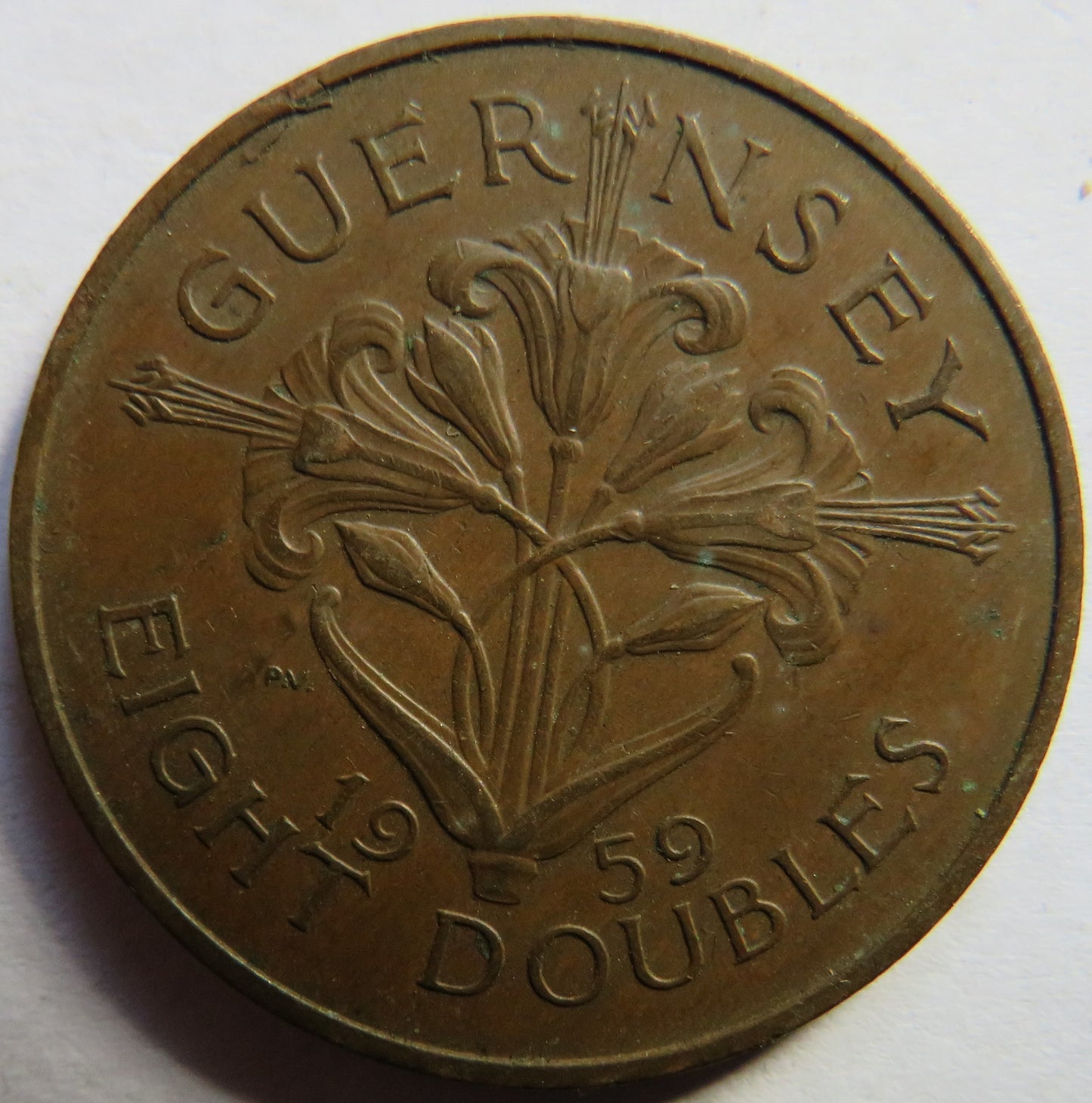 1959 Guernsey 8 Doubles Coin