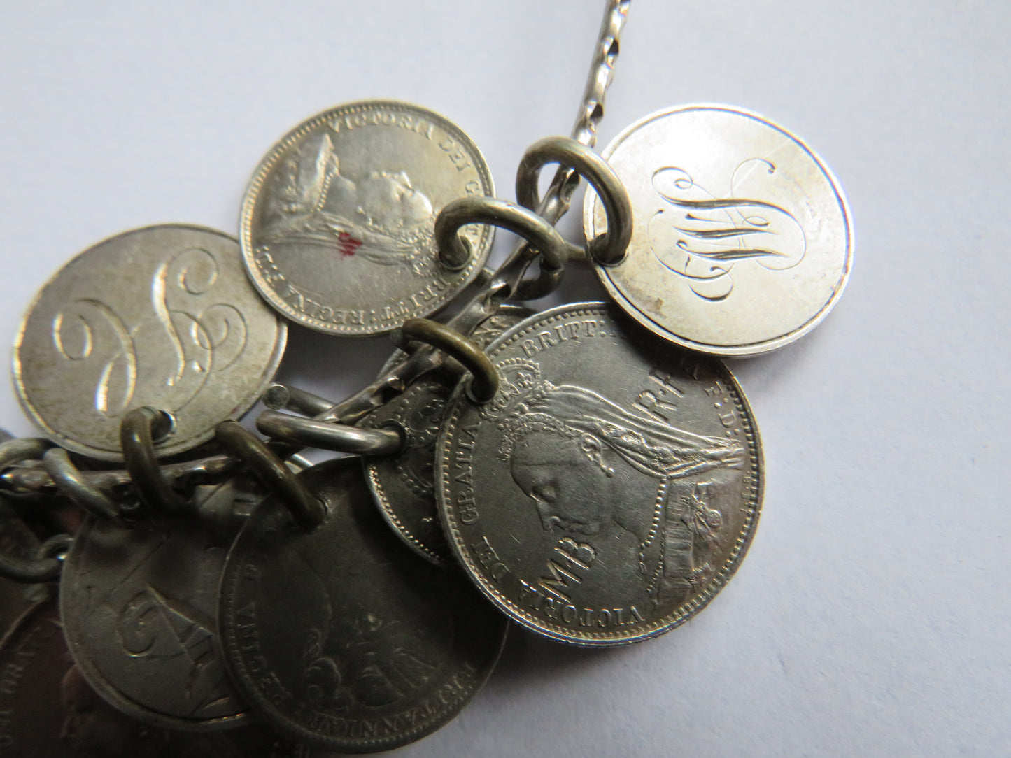 An Excellent Silver Bangle With 13 Victorian Engraved Love Tokens, Threepence, Sixpence etc.