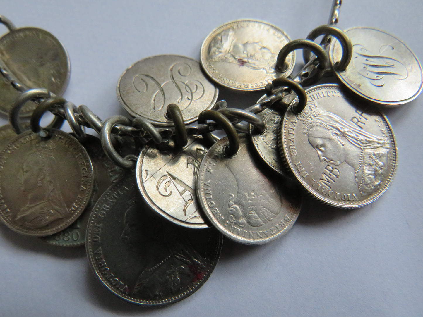 An Excellent Silver Bangle With 13 Victorian Engraved Love Tokens, Threepence, Sixpence etc.