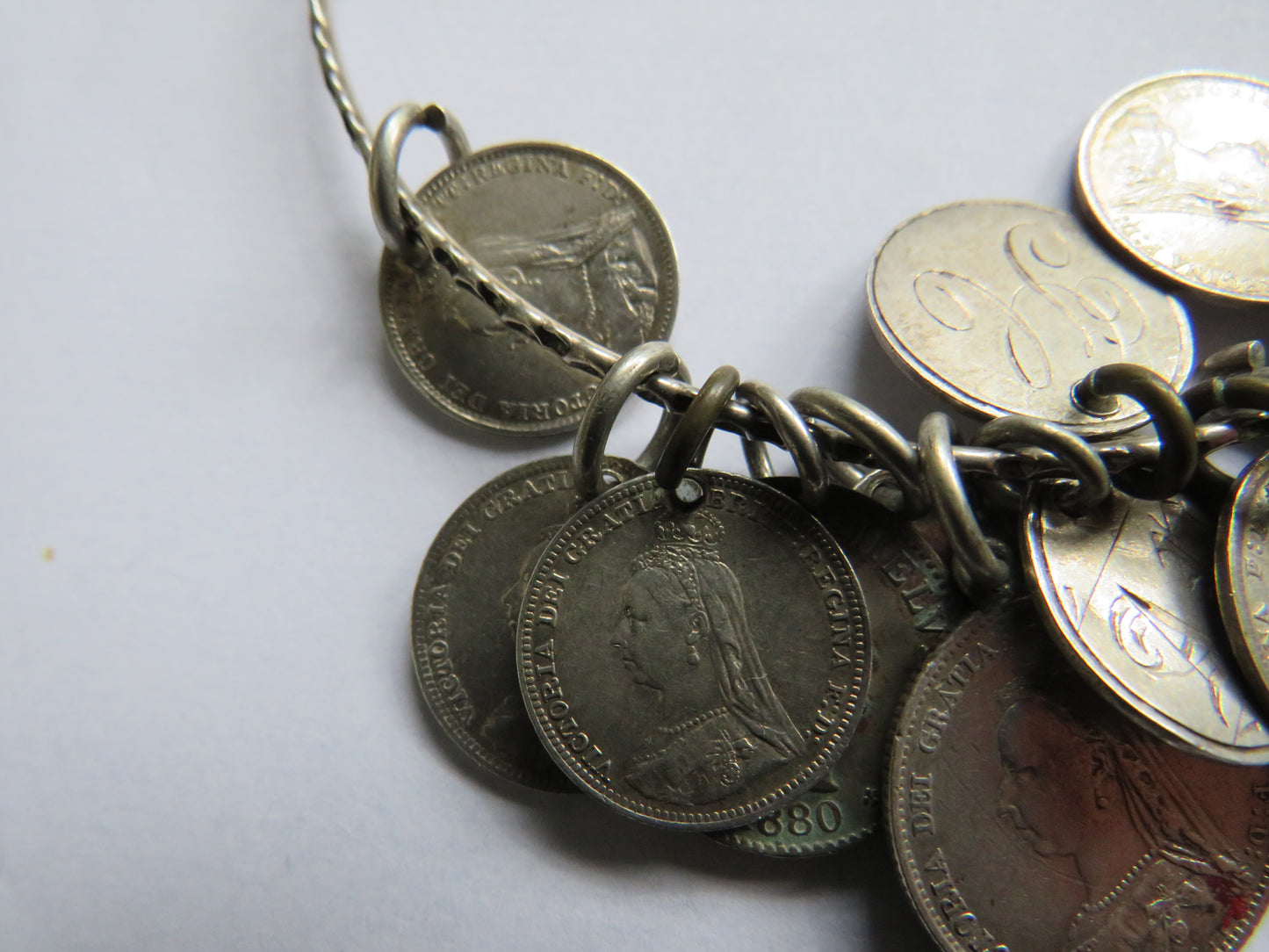 An Excellent Silver Bangle With 13 Victorian Engraved Love Tokens, Threepence, Sixpence etc.