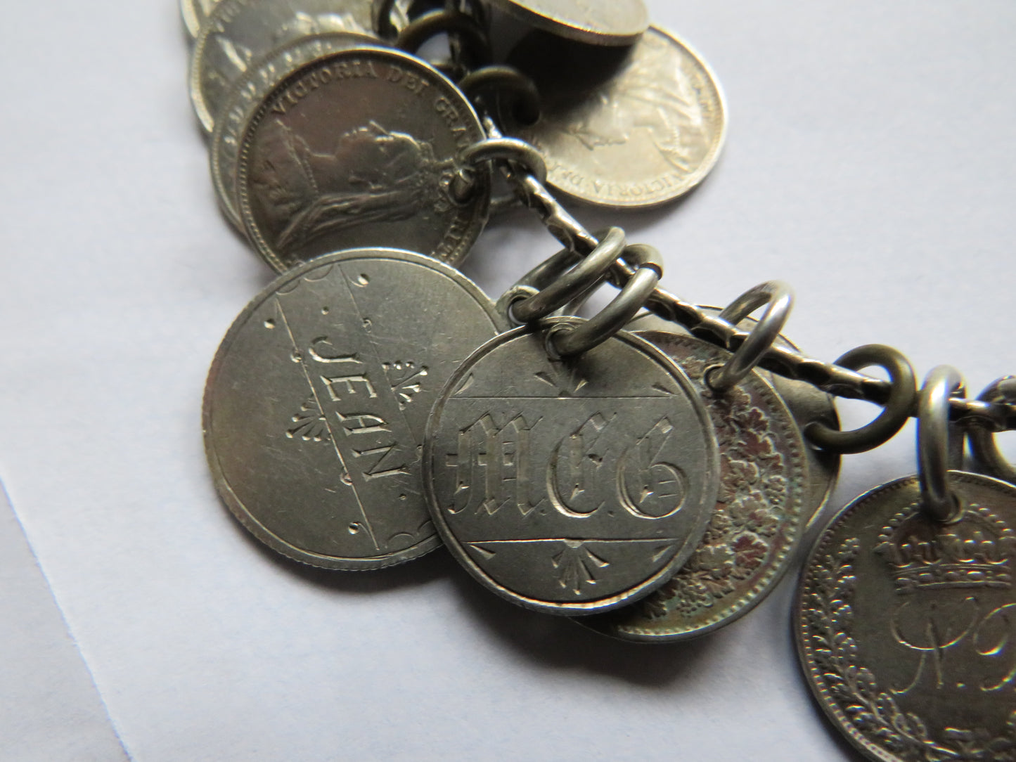 An Excellent Silver Bangle With 13 Victorian Engraved Love Tokens, Threepence, Sixpence etc.