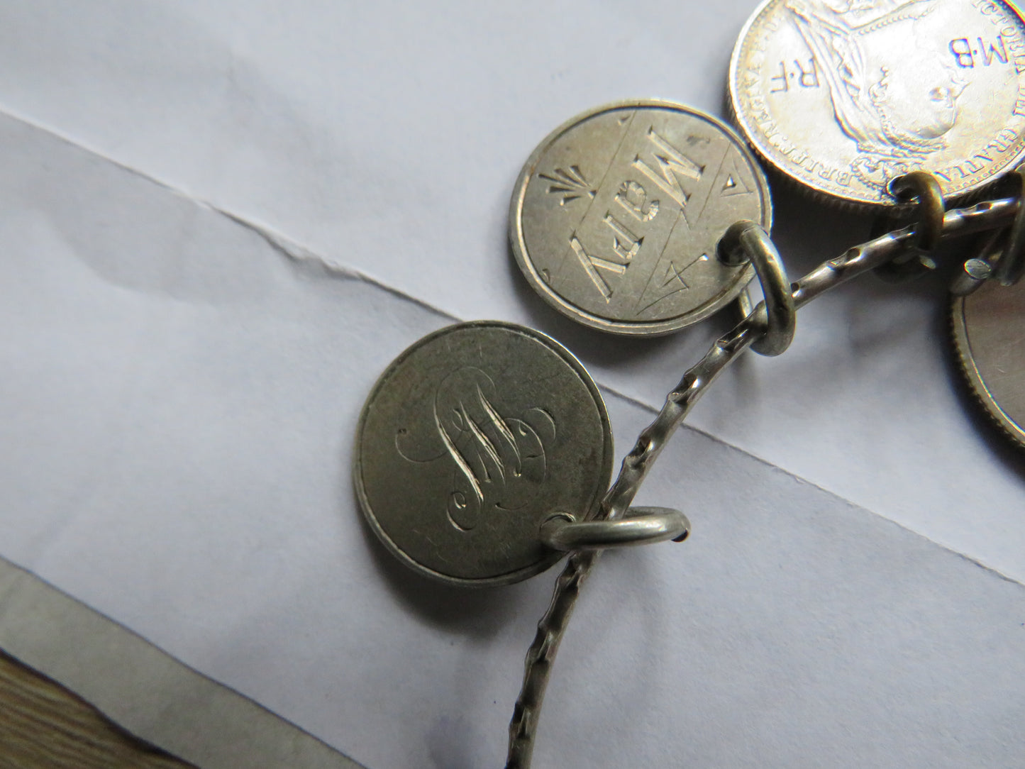 An Excellent Silver Bangle With 13 Victorian Engraved Love Tokens, Threepence, Sixpence etc.