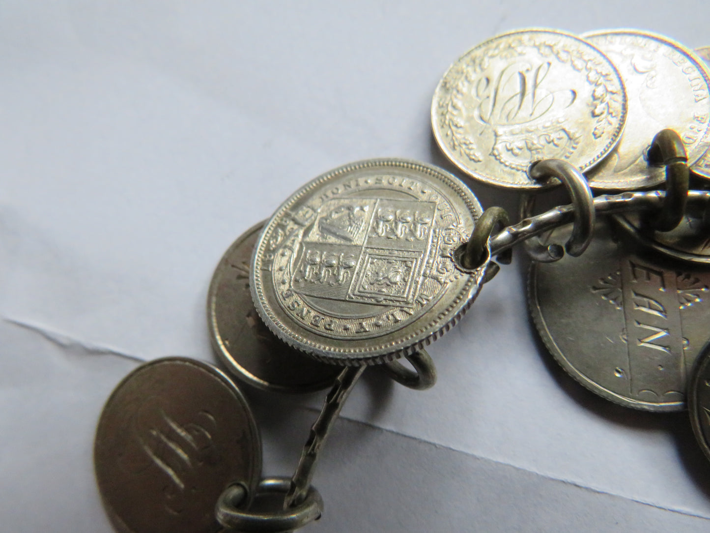 An Excellent Silver Bangle With 13 Victorian Engraved Love Tokens, Threepence, Sixpence etc.