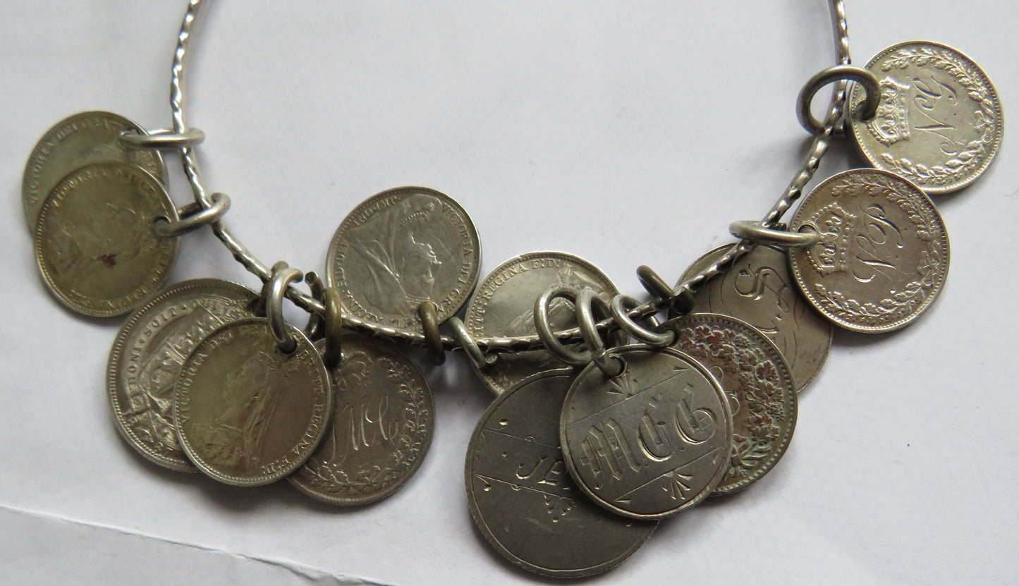 An Excellent Silver Bangle With 13 Victorian Engraved Love Tokens, Threepence, Sixpence etc.