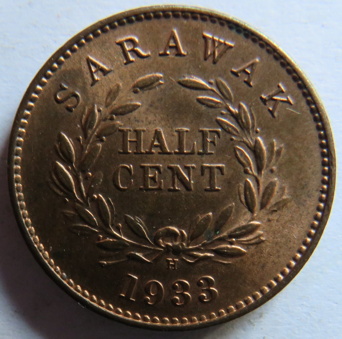 1933-H Sarawak 1/2 Half Cent Coin In High Grade.