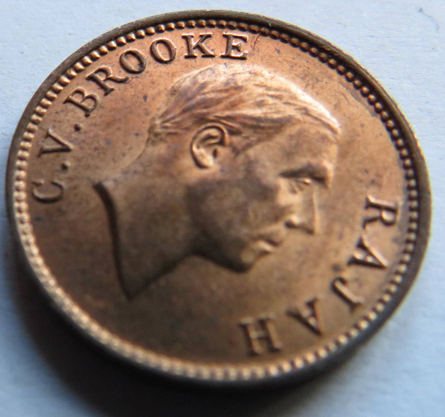 1933-H Sarawak 1/2 Half Cent Coin In High Grade.