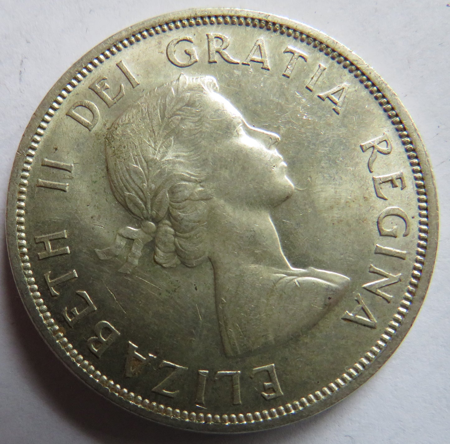 1858-1958 Queen Elizabeth II Canada Silver $1 One Dollar Coin.
