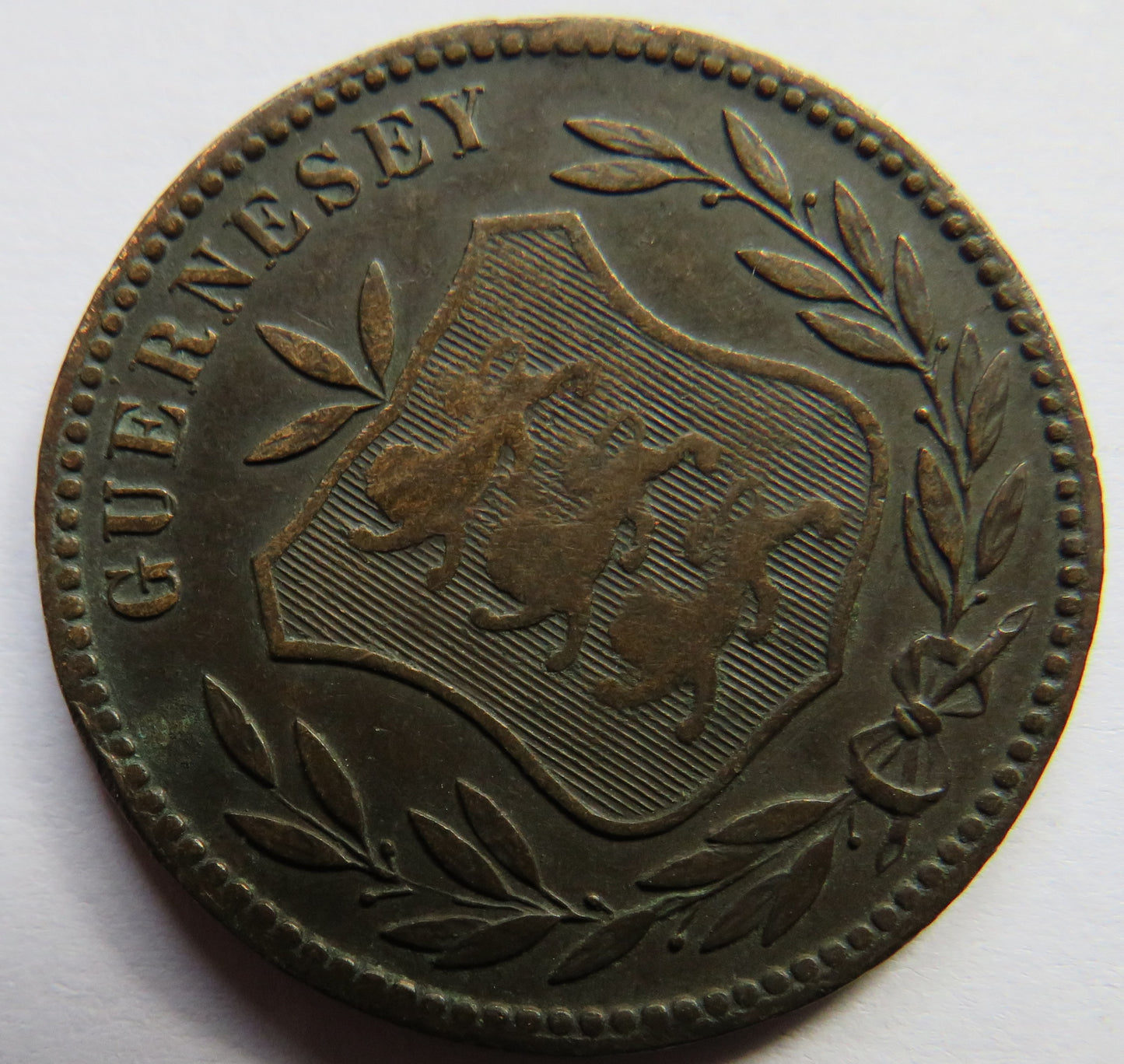 1902-H Guernsey 8 Doubles Coin