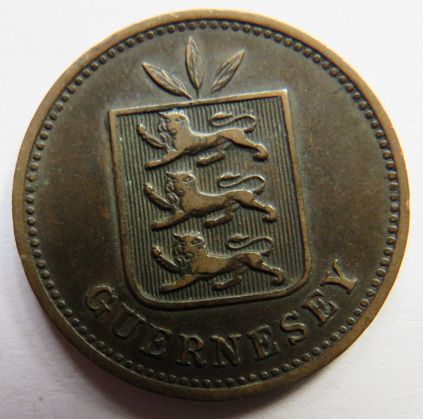 1889-H Guernsey 4 Doubles Coin