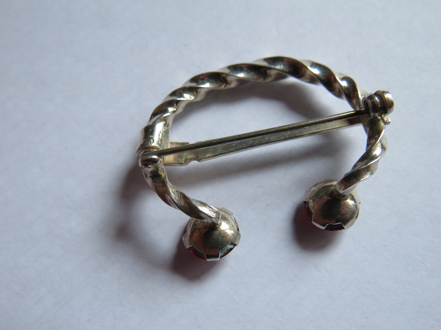 Vintage White Metal & Red Stone Scottish Penannular Brooch