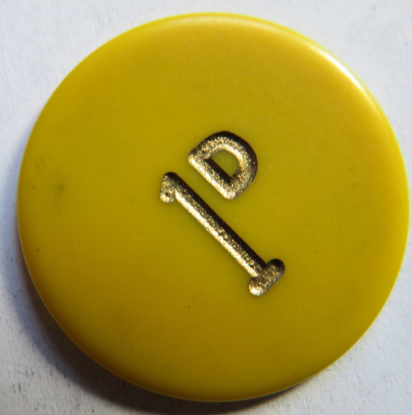 P.L.C. Vintage Yellow Plastic 1d Token