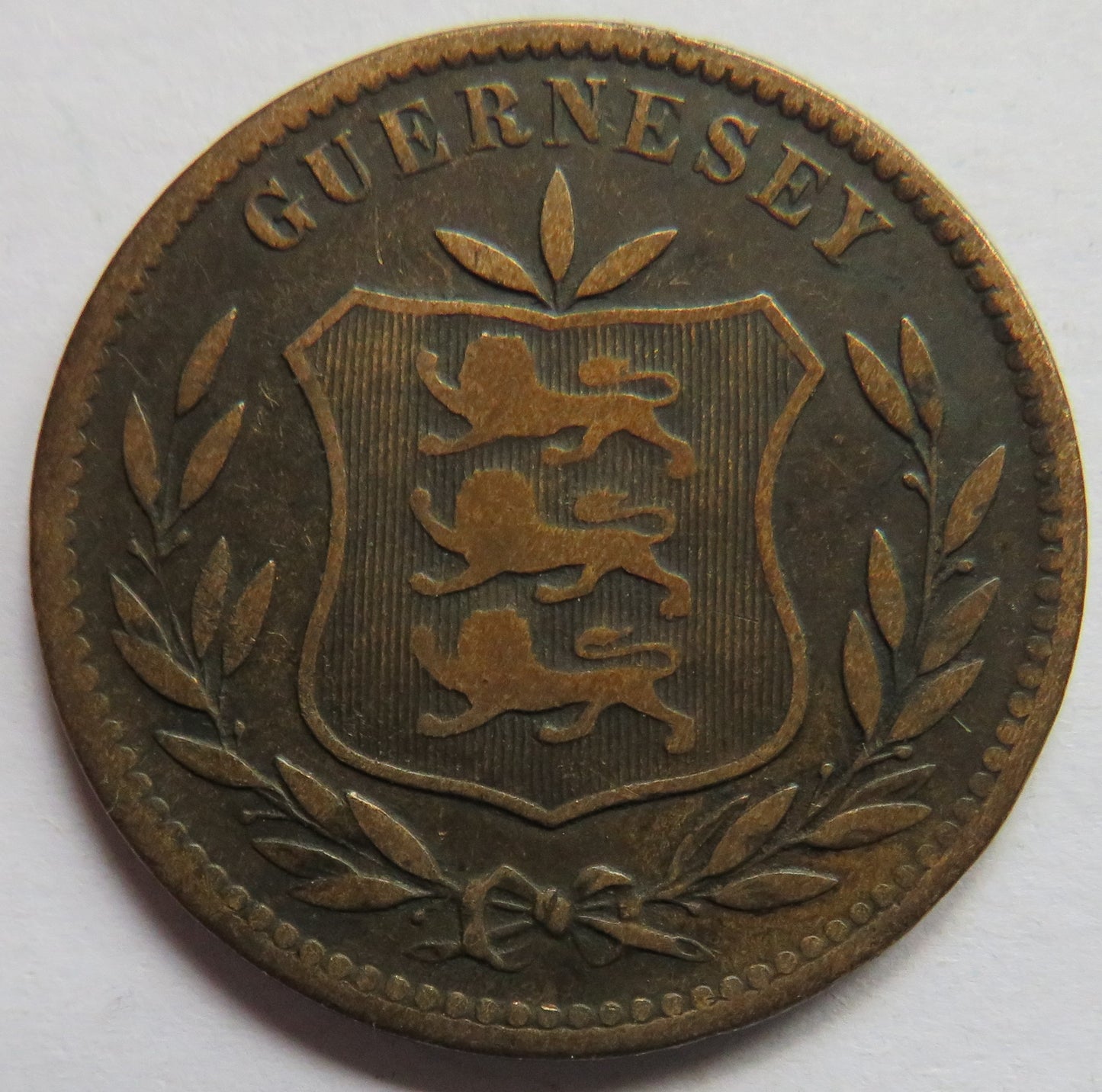 1903-H Guernsey 8 Doubles Coin