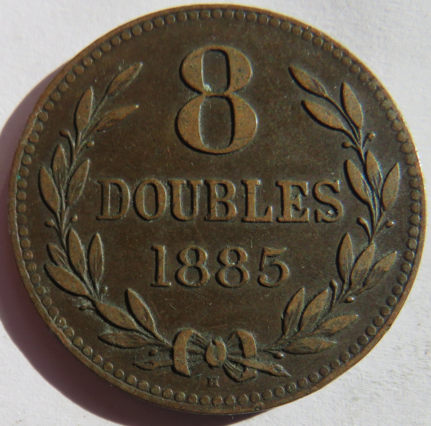 1885-H Guernsey 8 Doubles Coin