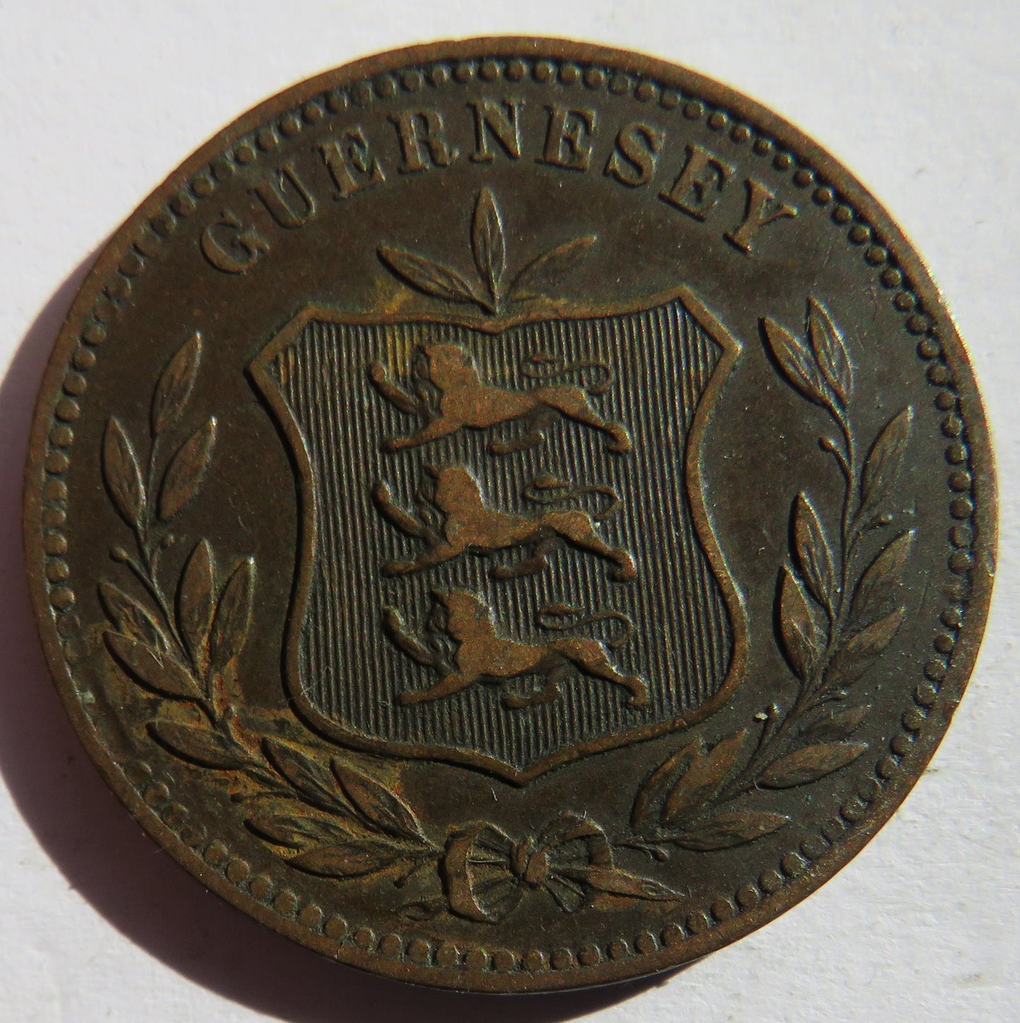 1885-H Guernsey 8 Doubles Coin