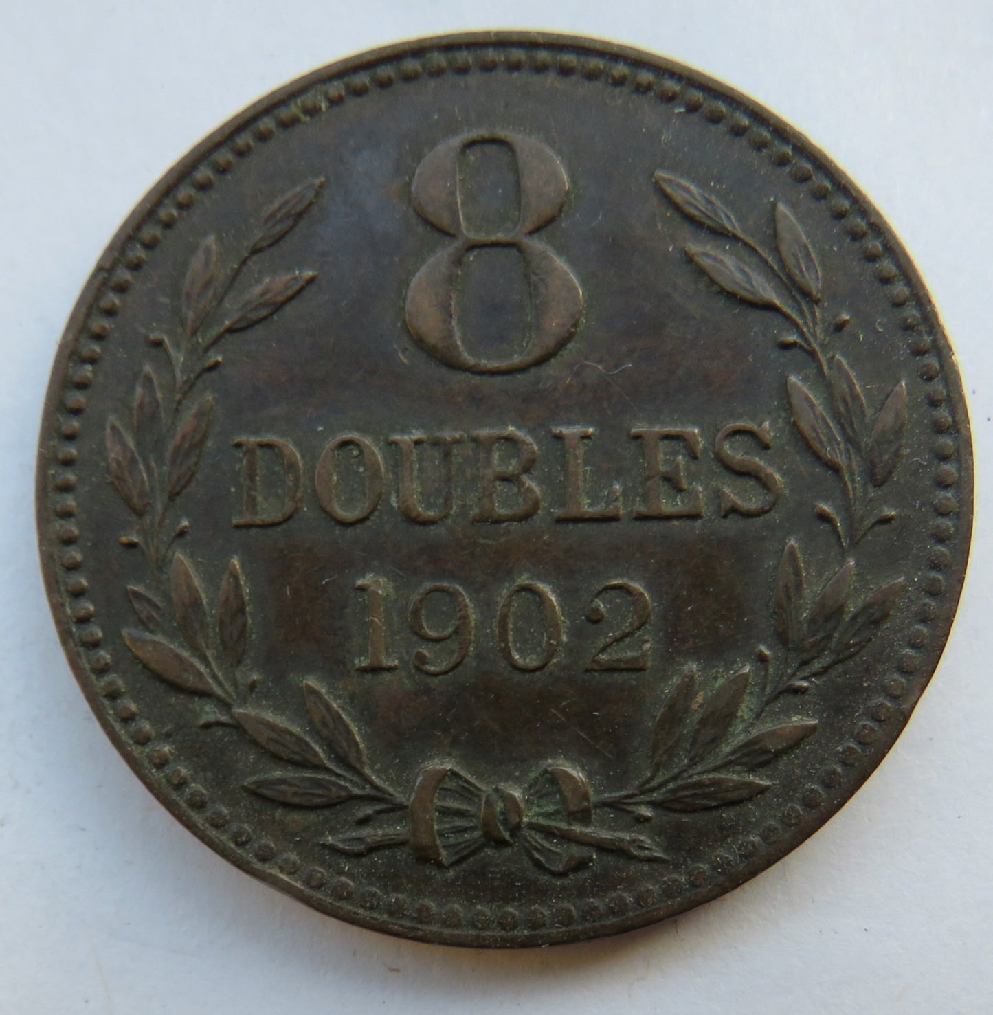 1902 Guernsey 8 Doubles Coin