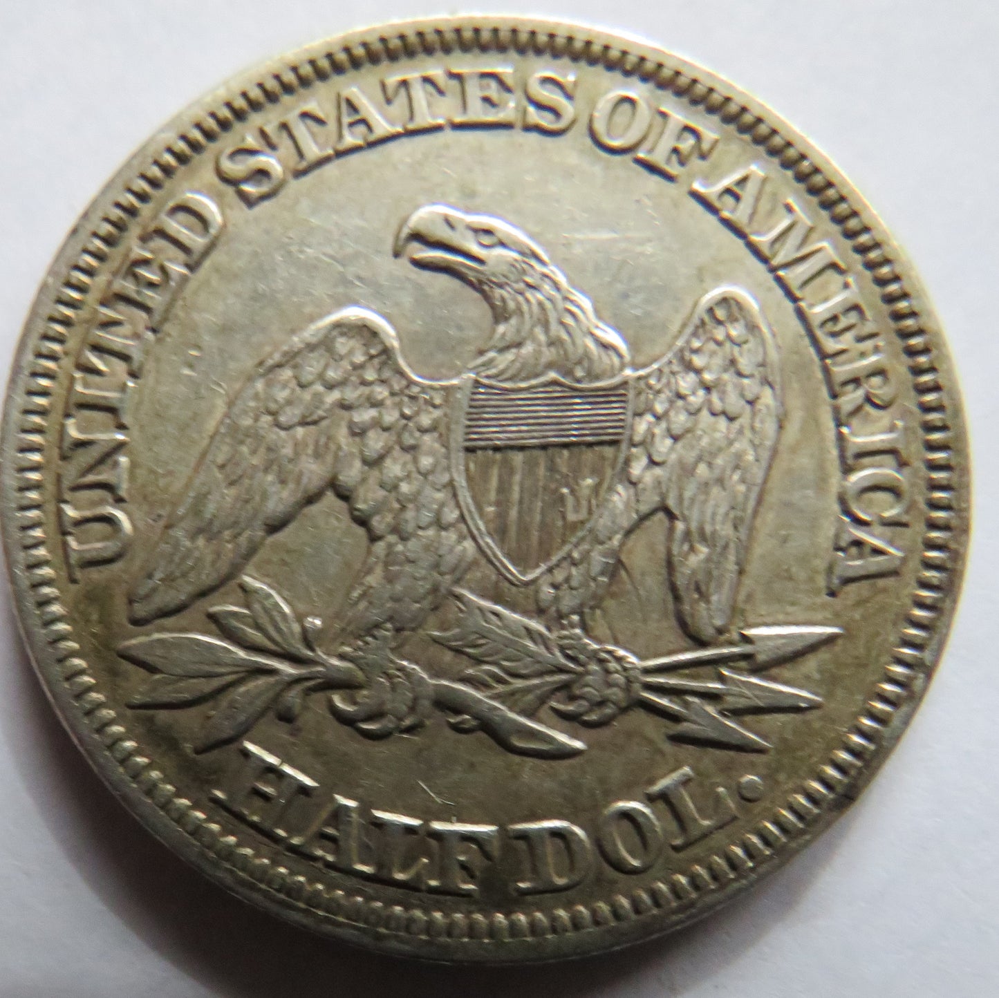 1858 USA Seated Liberty Silver $1/2 Half-Dollar Coin In High Grade