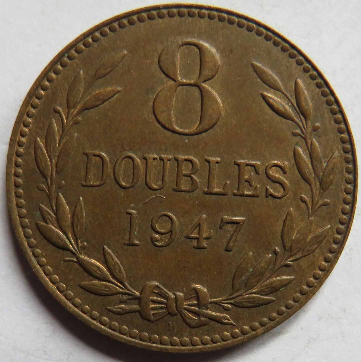 1947-H Guernsey 8 Doubles Coin
