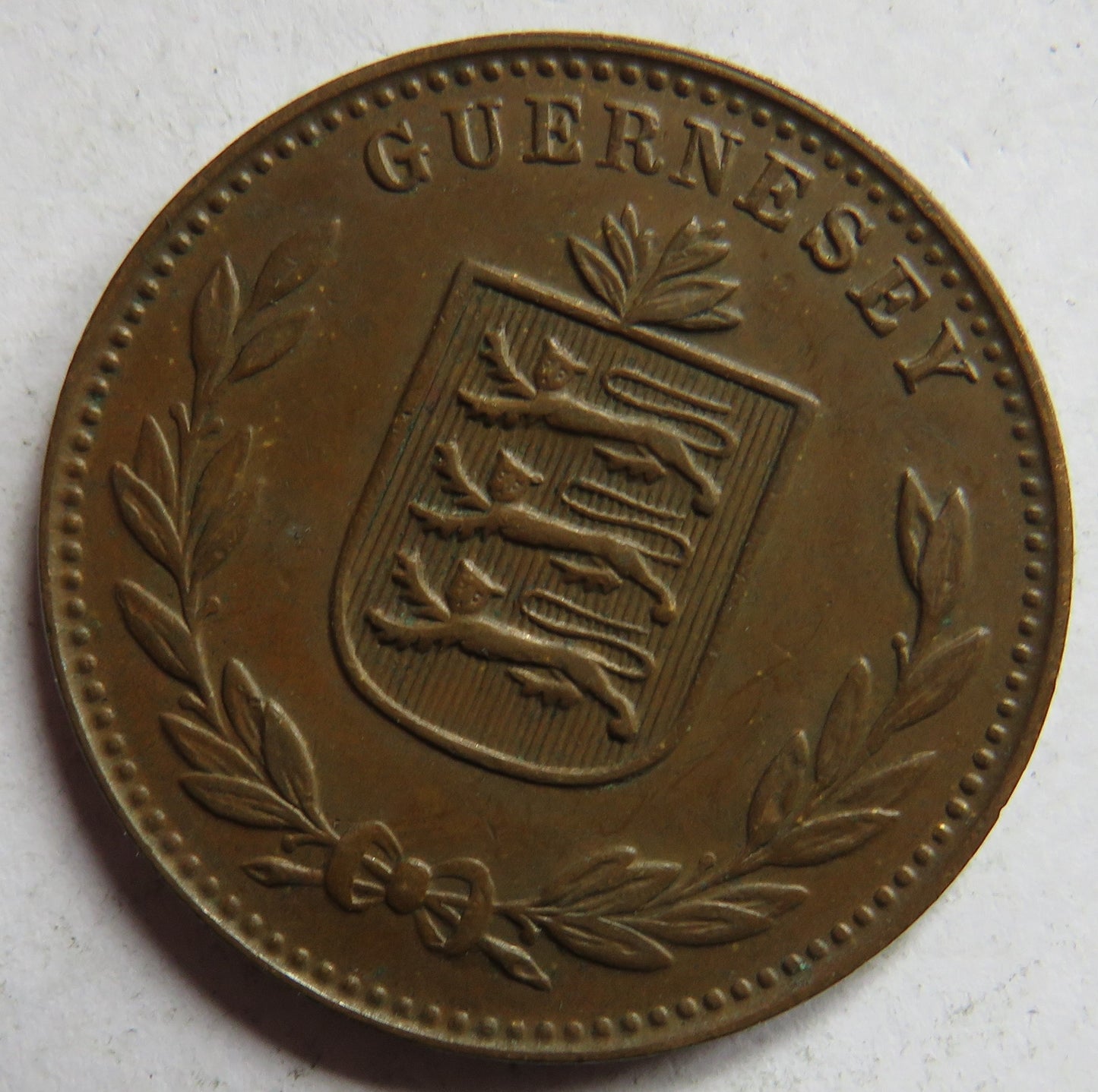 1938-H Guernsey 8 Doubles Coin