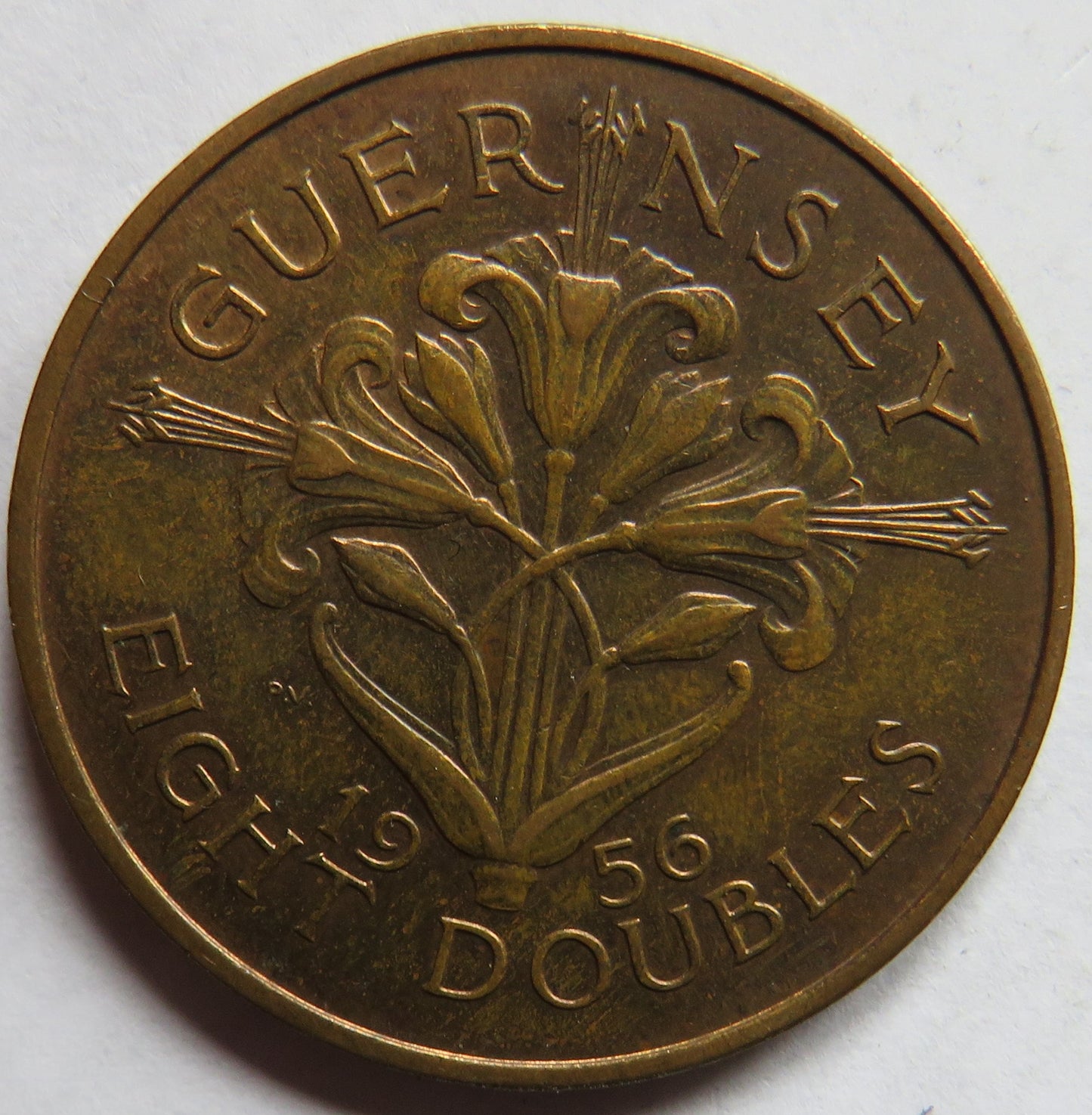 1956 Guernsey 8 Doubles Coin