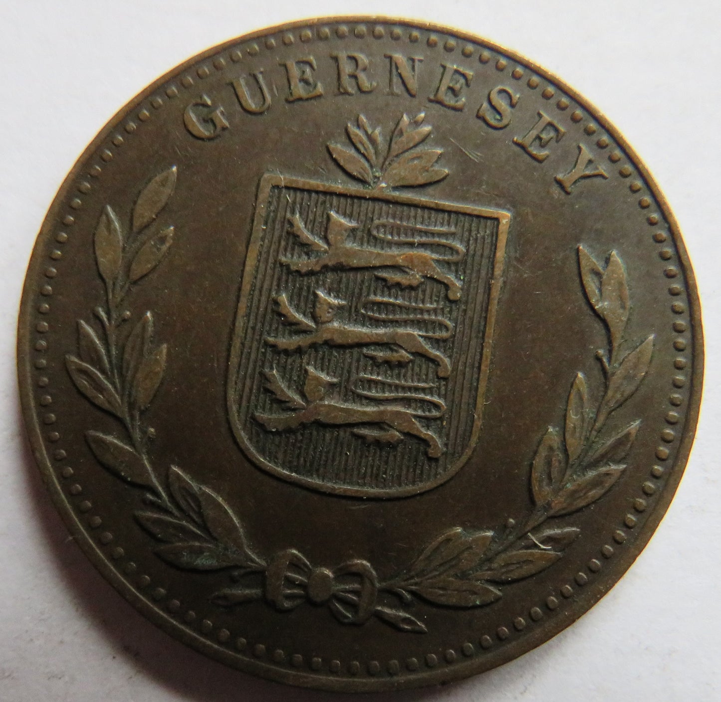 1918 Guernsey 8 Doubles Coin