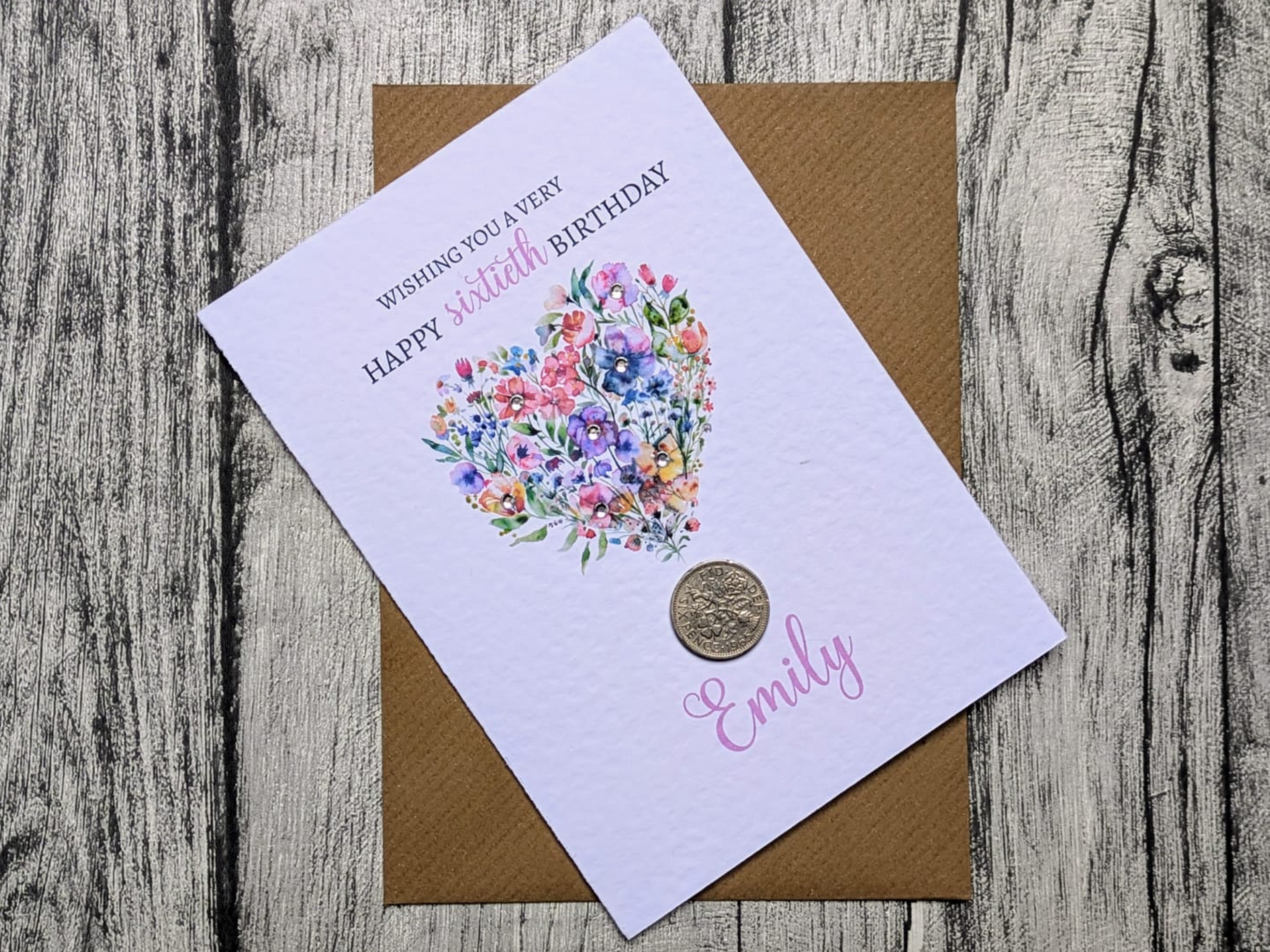 Floral heart 60th birthday card with real 1966 sixpence on brown Kraft envelope