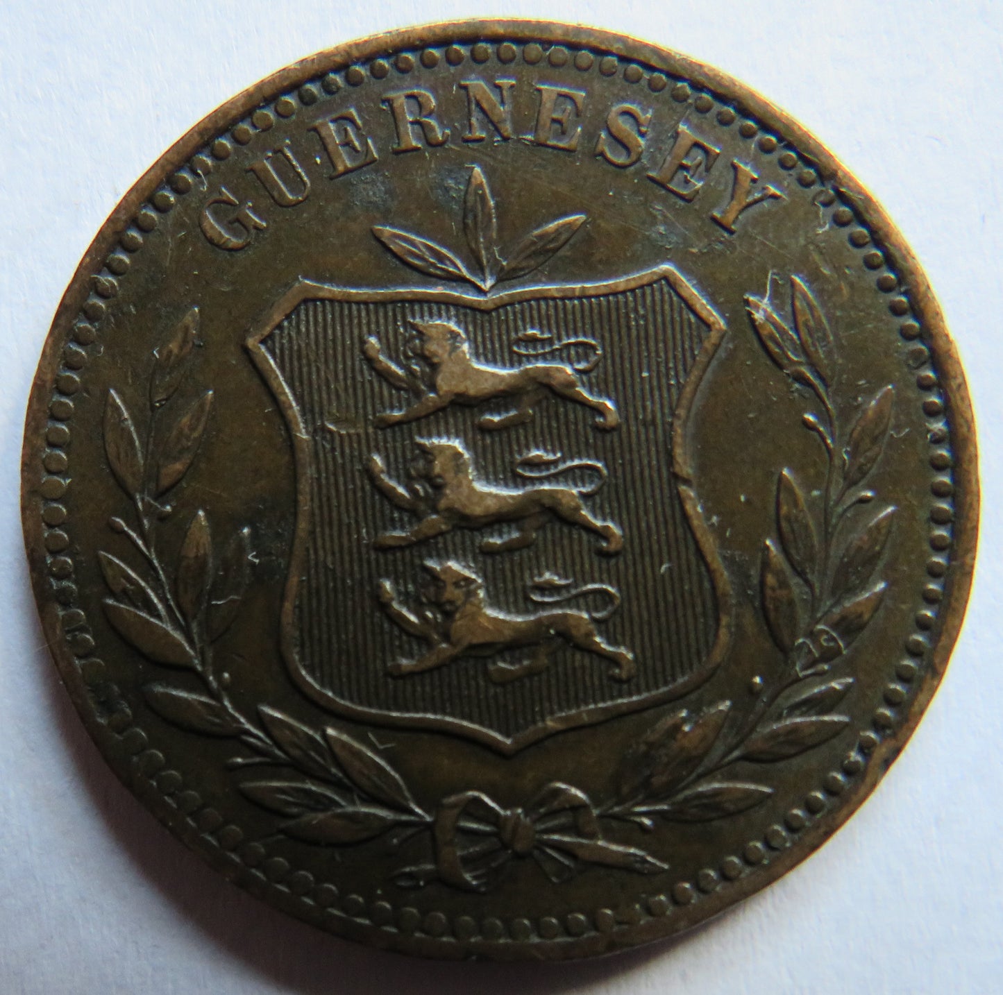 1885-H Guernsey 8 Doubles Coin