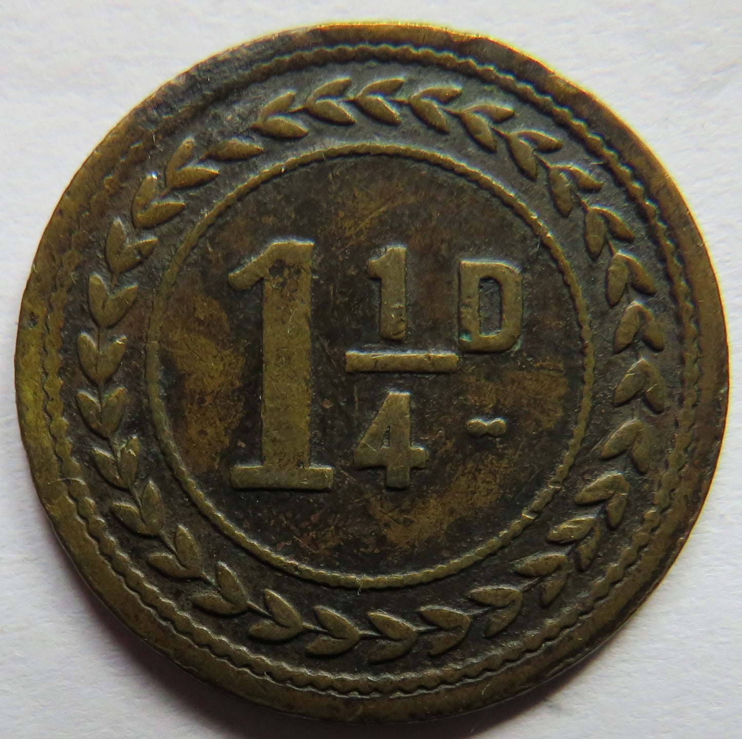 1 & 1/4d J.A. Clarke Antique Token