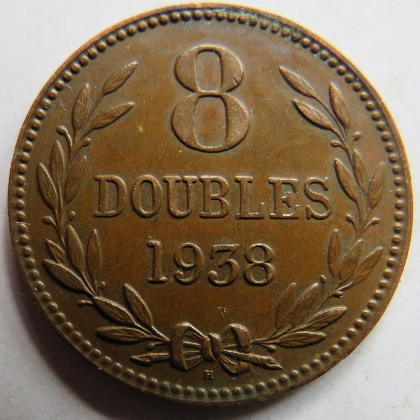 1938-H Guernsey 8 Doubles Coin
