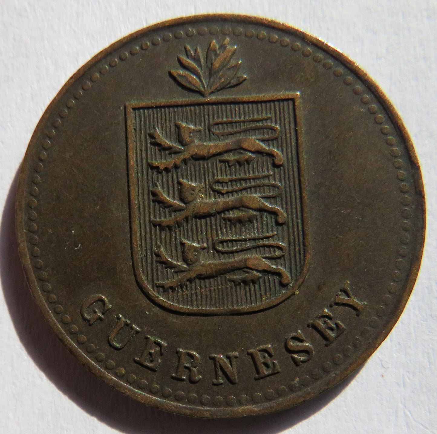 1920-H Guernsey 4 Doubles Coin