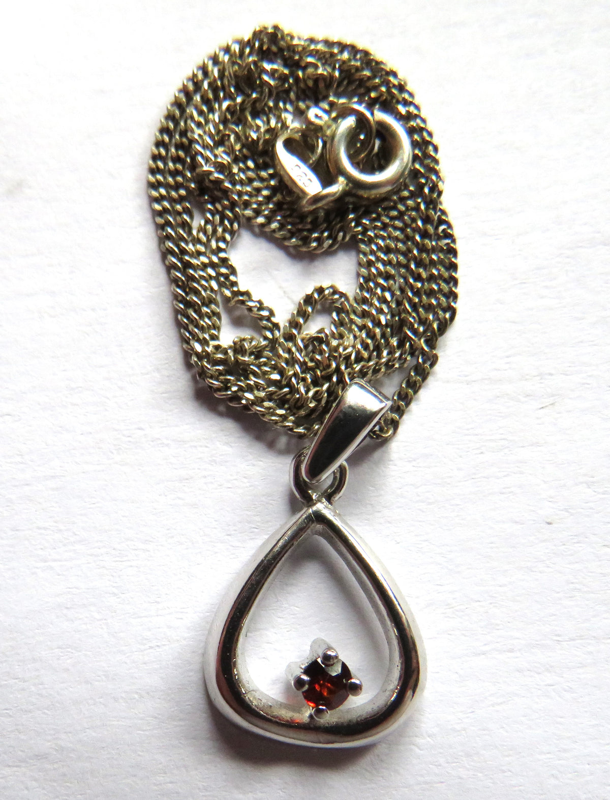 Styling Ladies Sterling Silver Necklace & Pendant with Small Red Stone