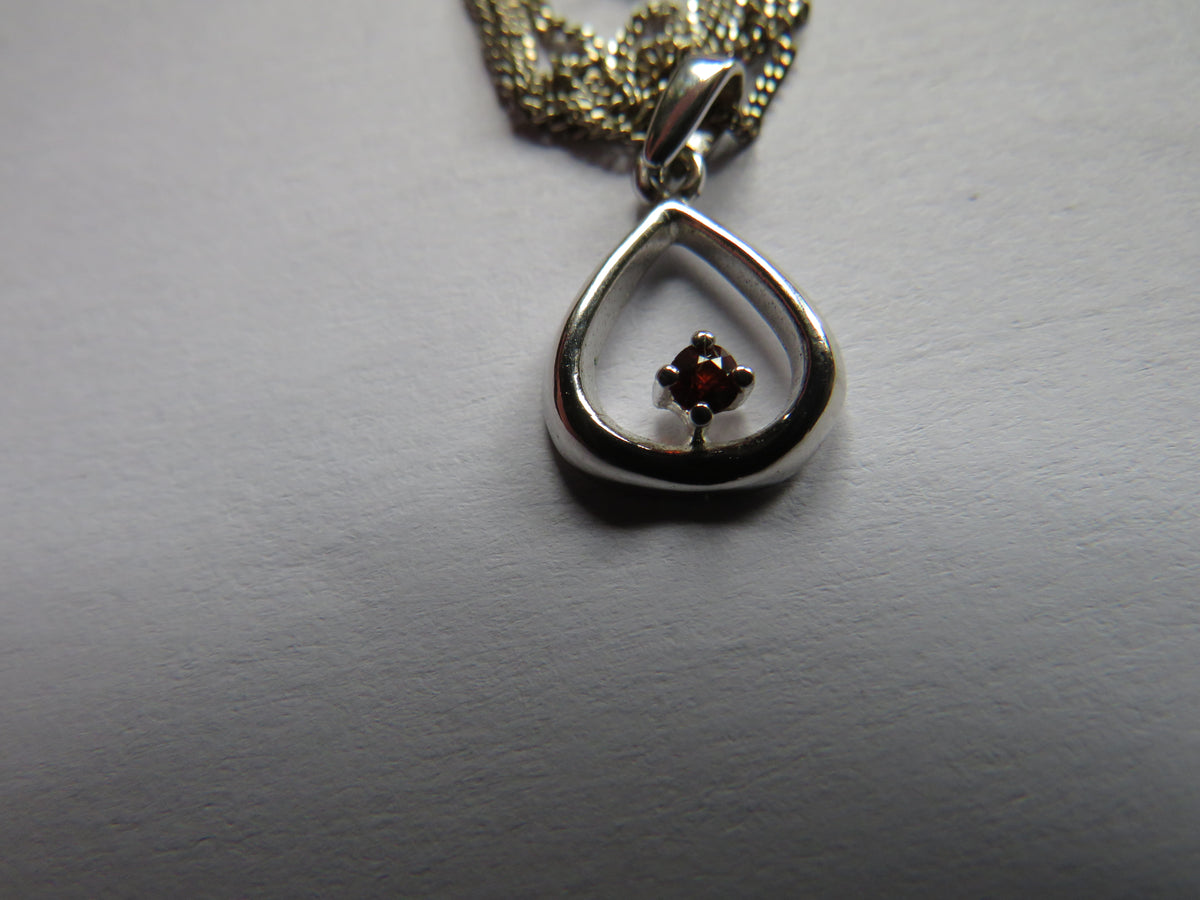 Styling Ladies Sterling Silver Necklace & Pendant with Small Red Stone