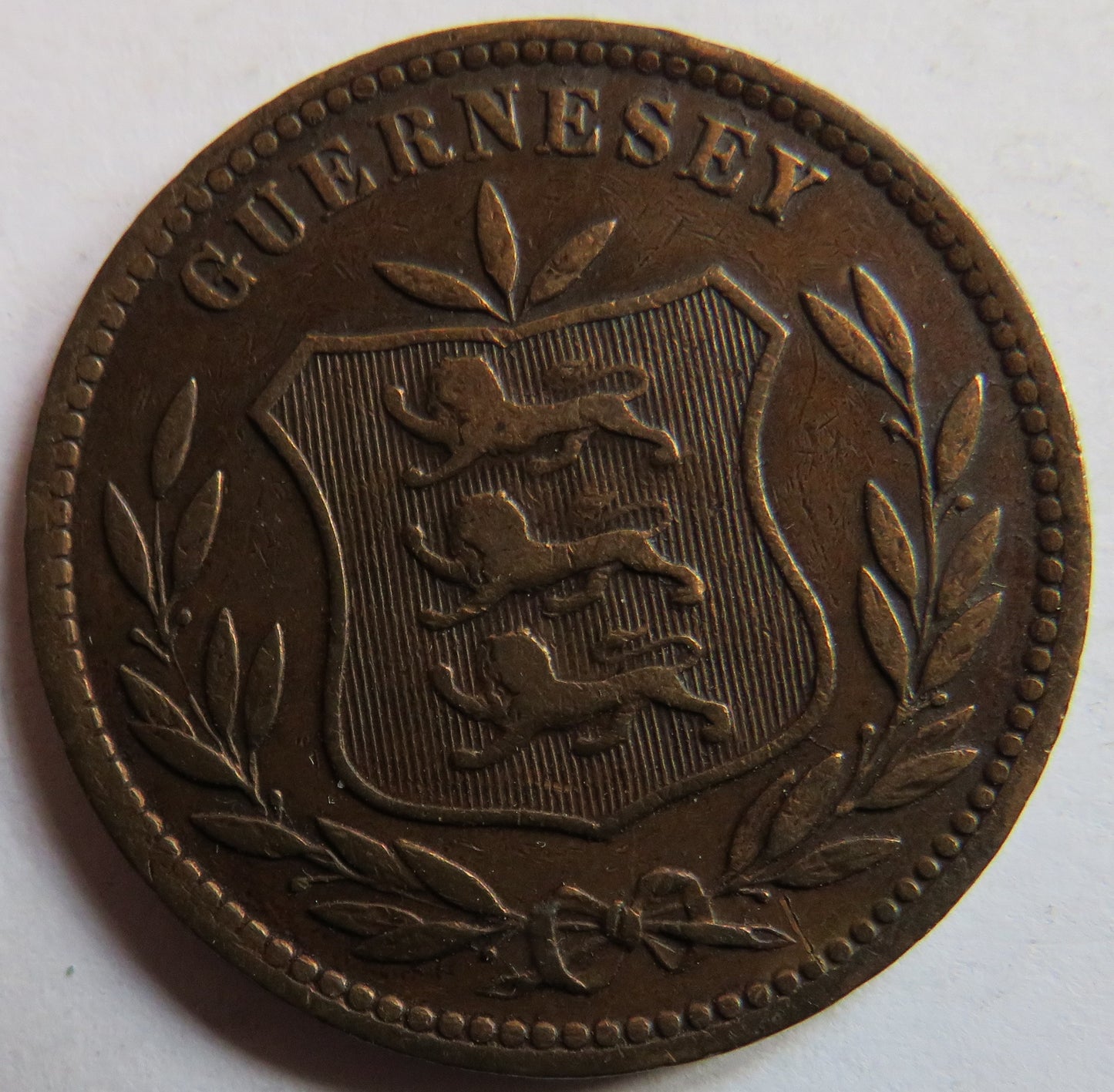 1902-H Guernsey 8 Doubles Coin