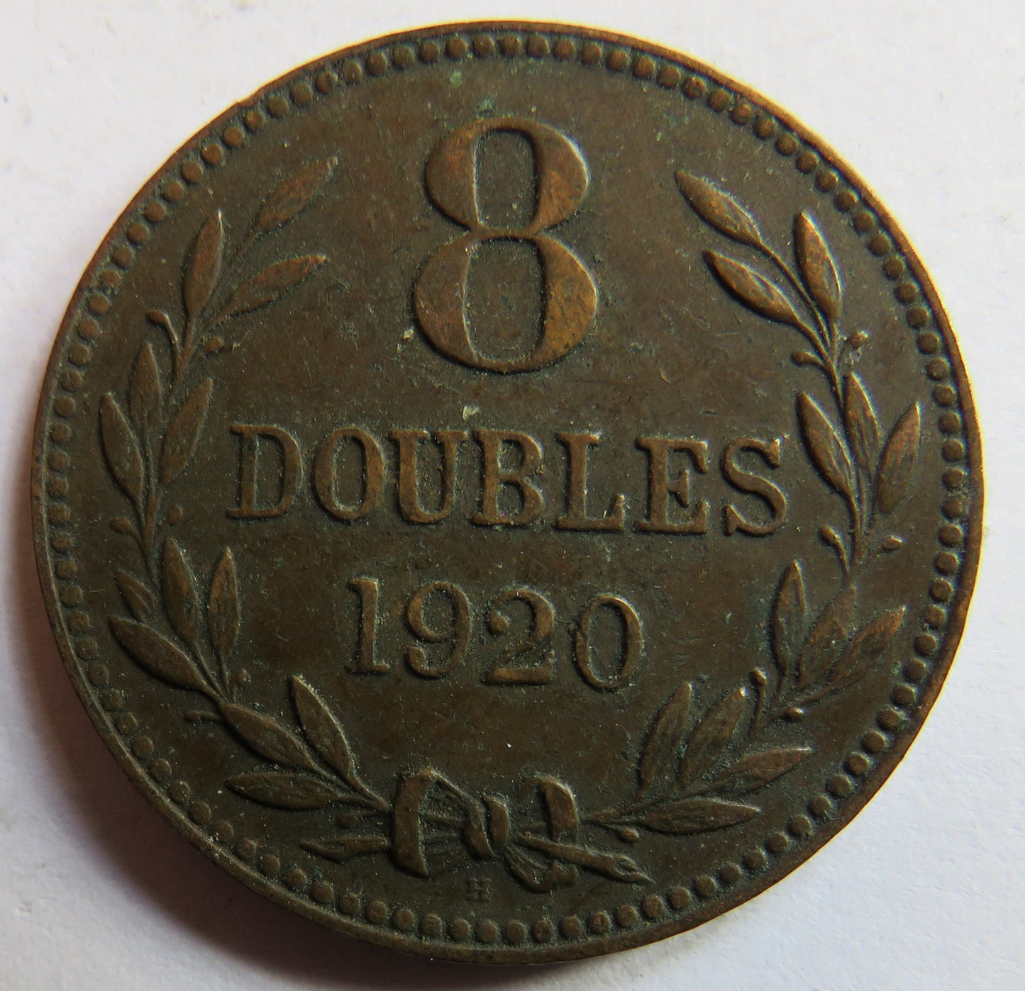 1920-H Guernsey 8 Doubles Coin