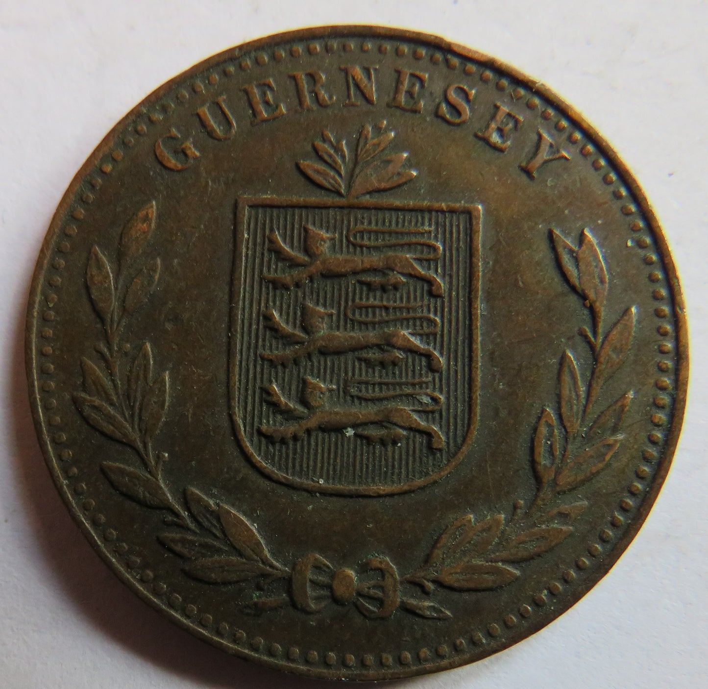 1920-H Guernsey 8 Doubles Coin