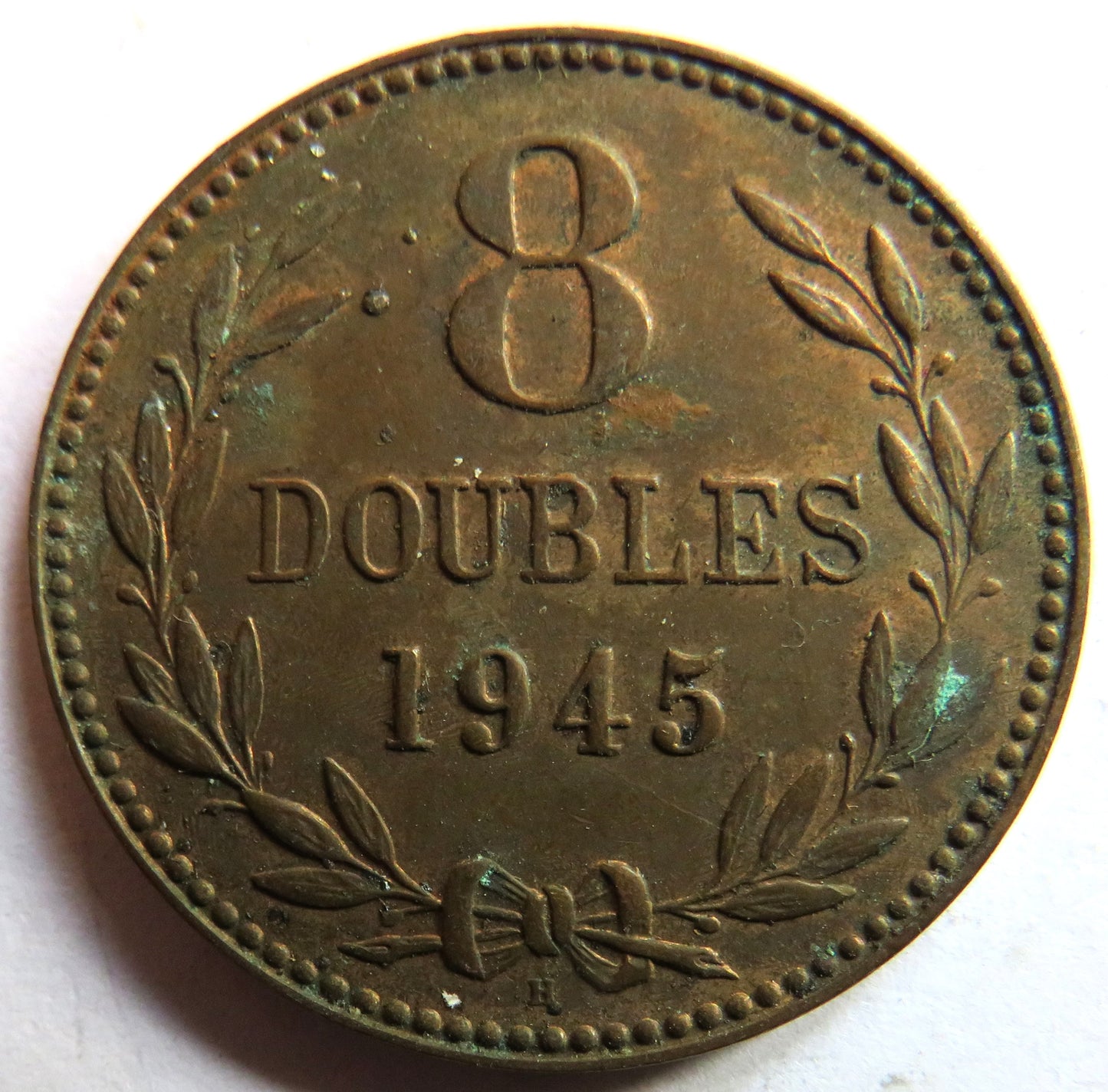 1945 Guernsey 8 Doubles Coin