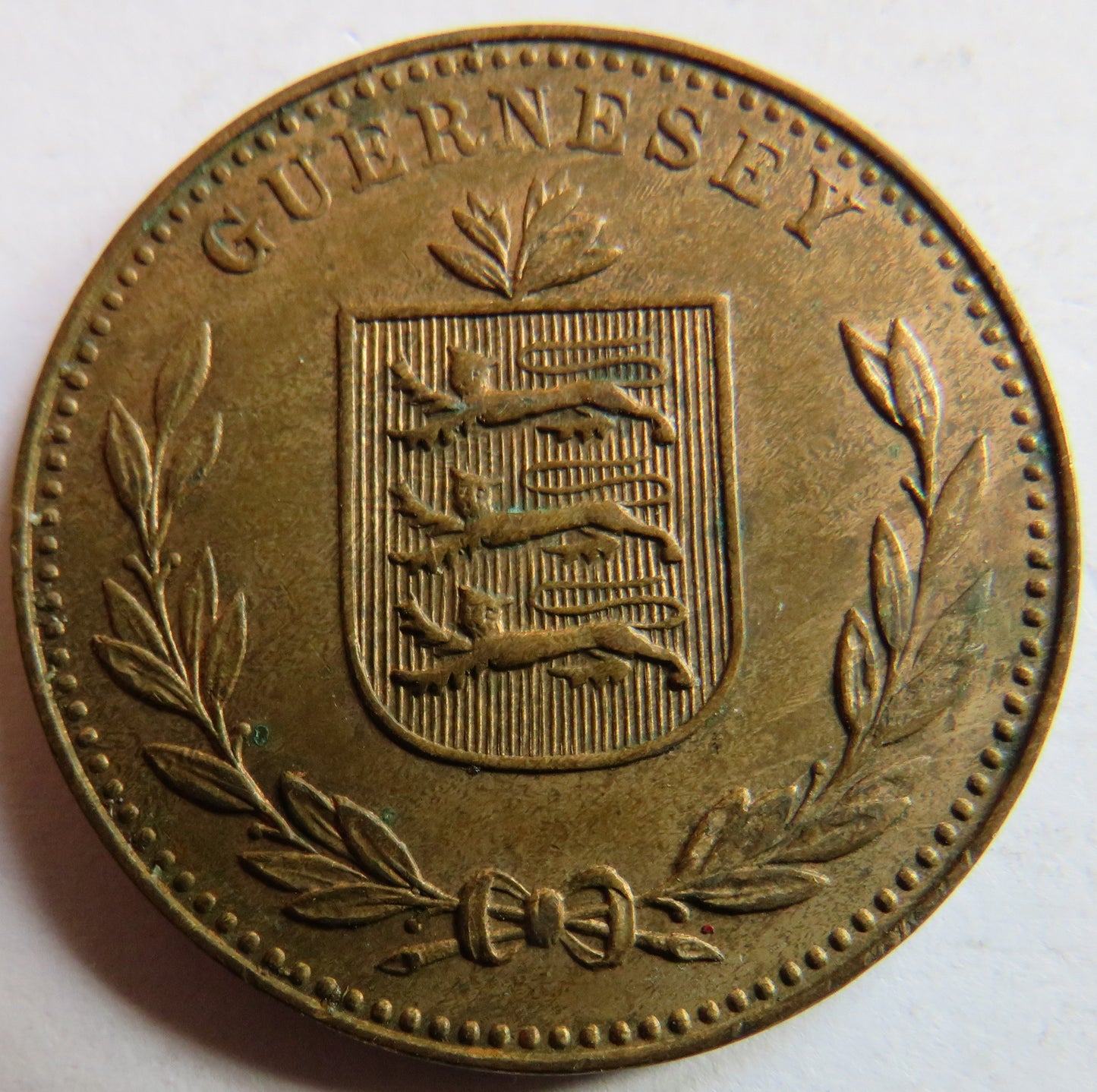 1945 Guernsey 8 Doubles Coin