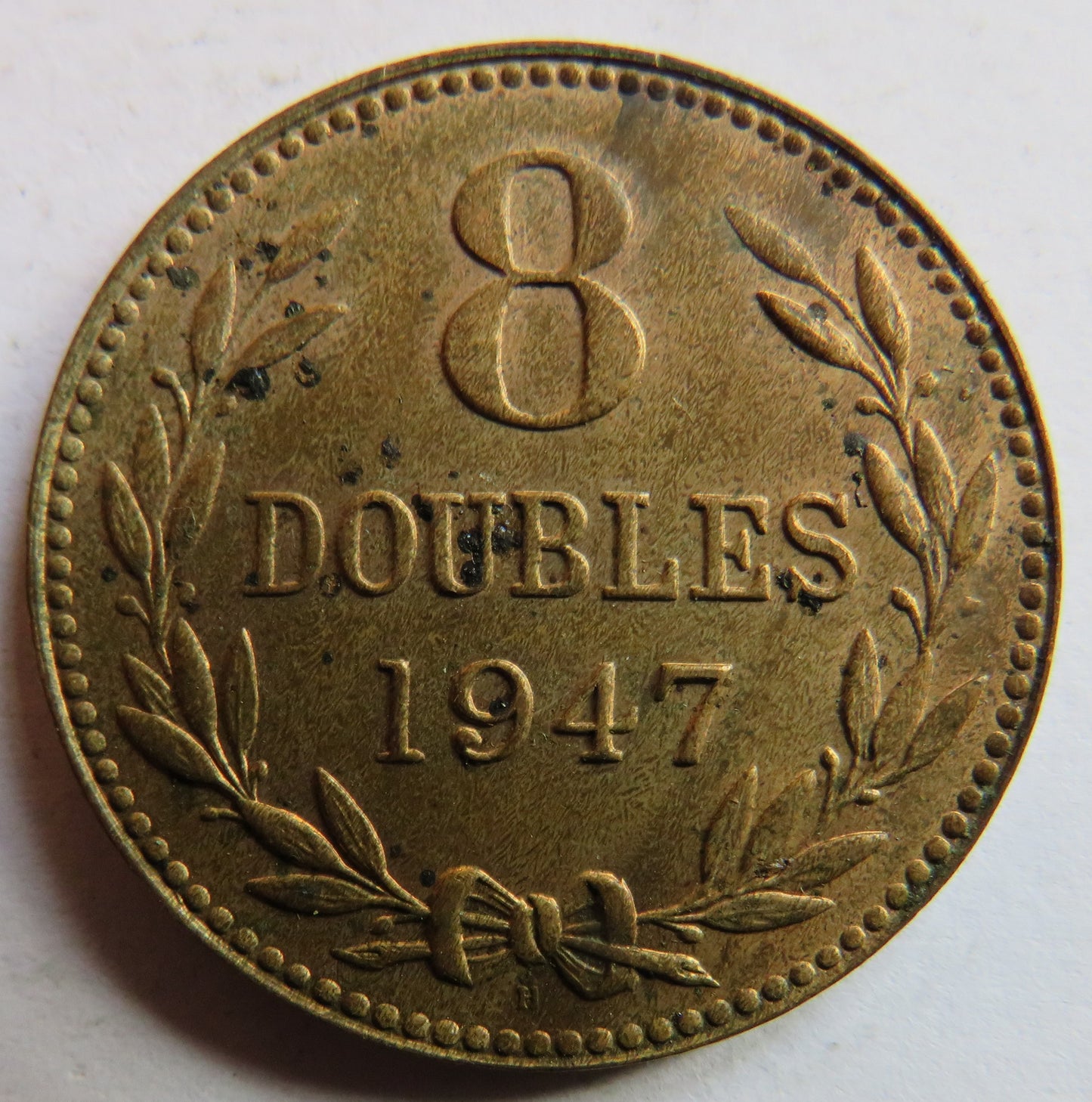 1947 Guernsey 8 Doubles Coin In High Grade