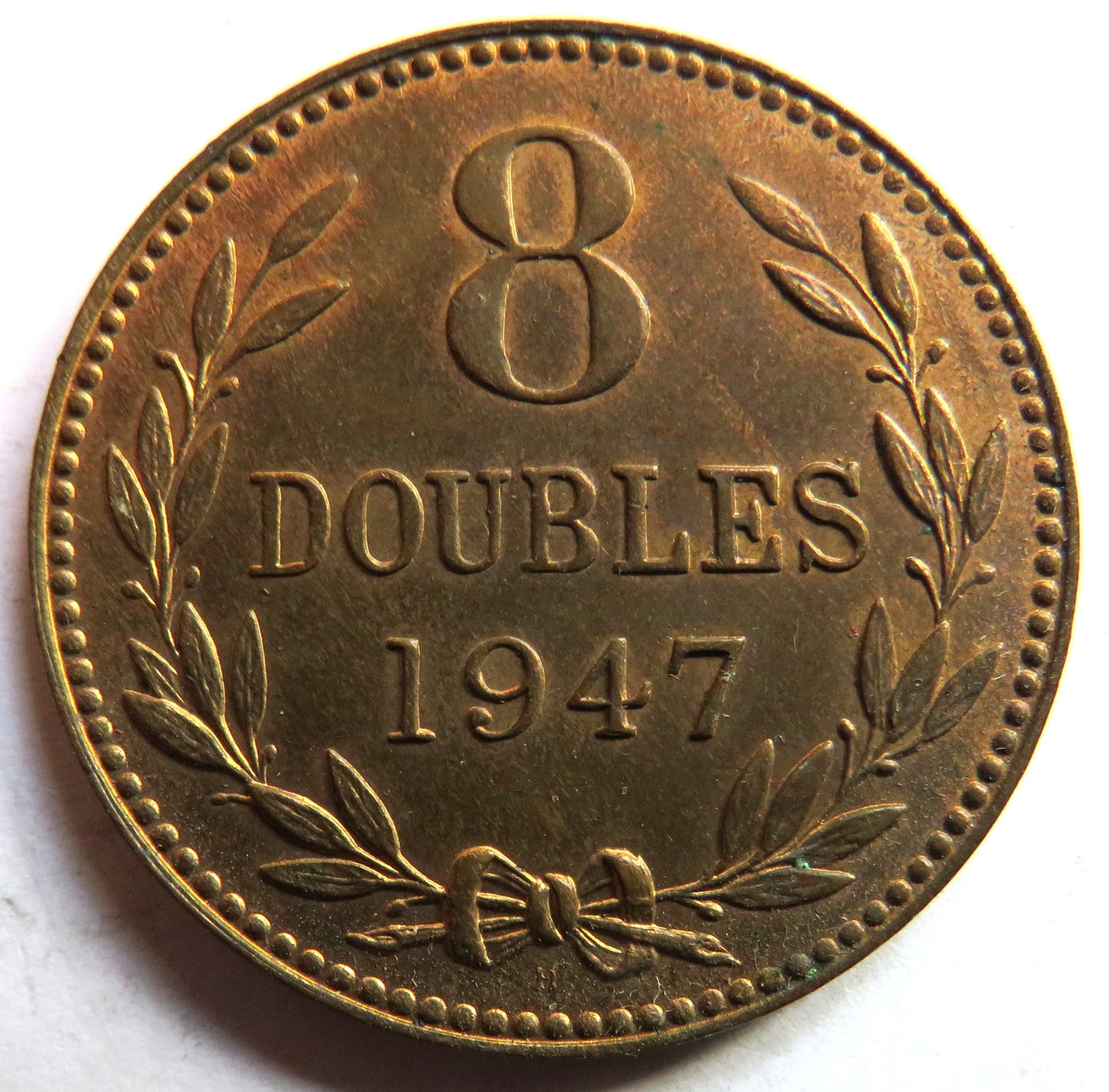 1947 Guernsey 8 Doubles Coin In High Grade