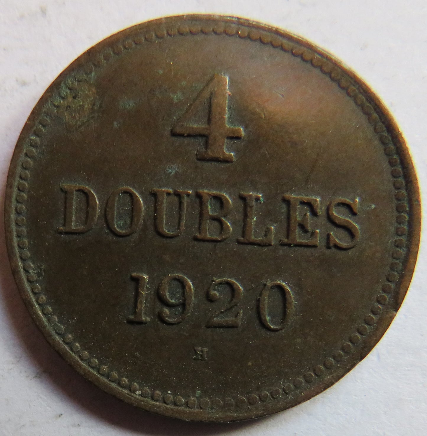 1920-H Guernsey 4 Doubles Coin