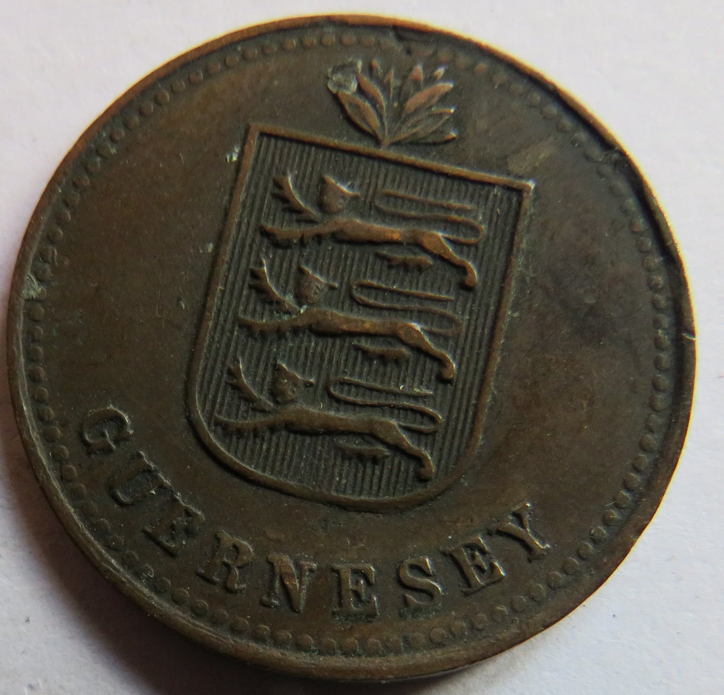 1920-H Guernsey 4 Doubles Coin