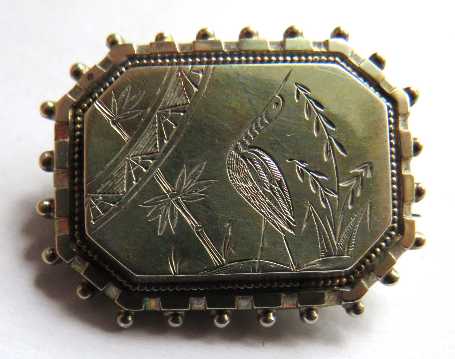 Antique White Metal Ladies Brooch With Engraved Bird Design