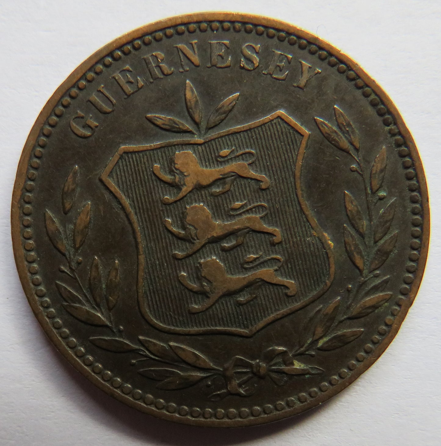 1911-H Guernsey 8 Doubles Coin