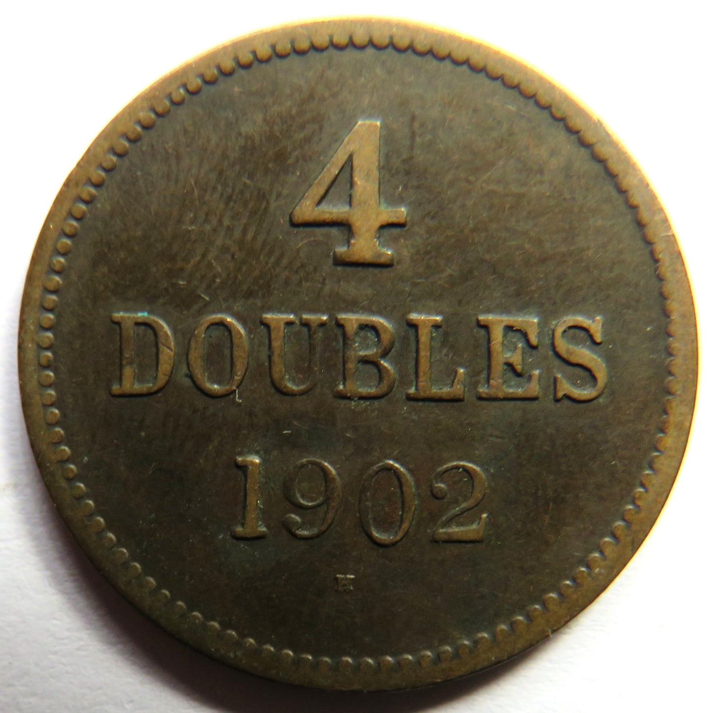 1902-H Guernsey 4 Doubles Coin