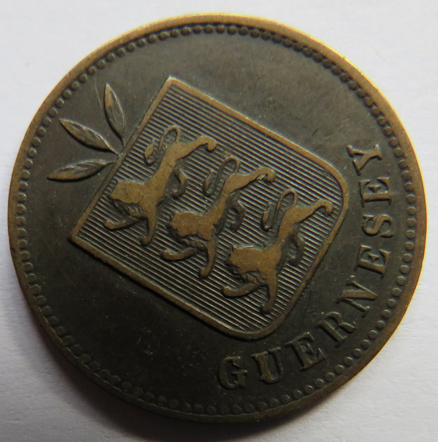 1902-H Guernsey 4 Doubles Coin